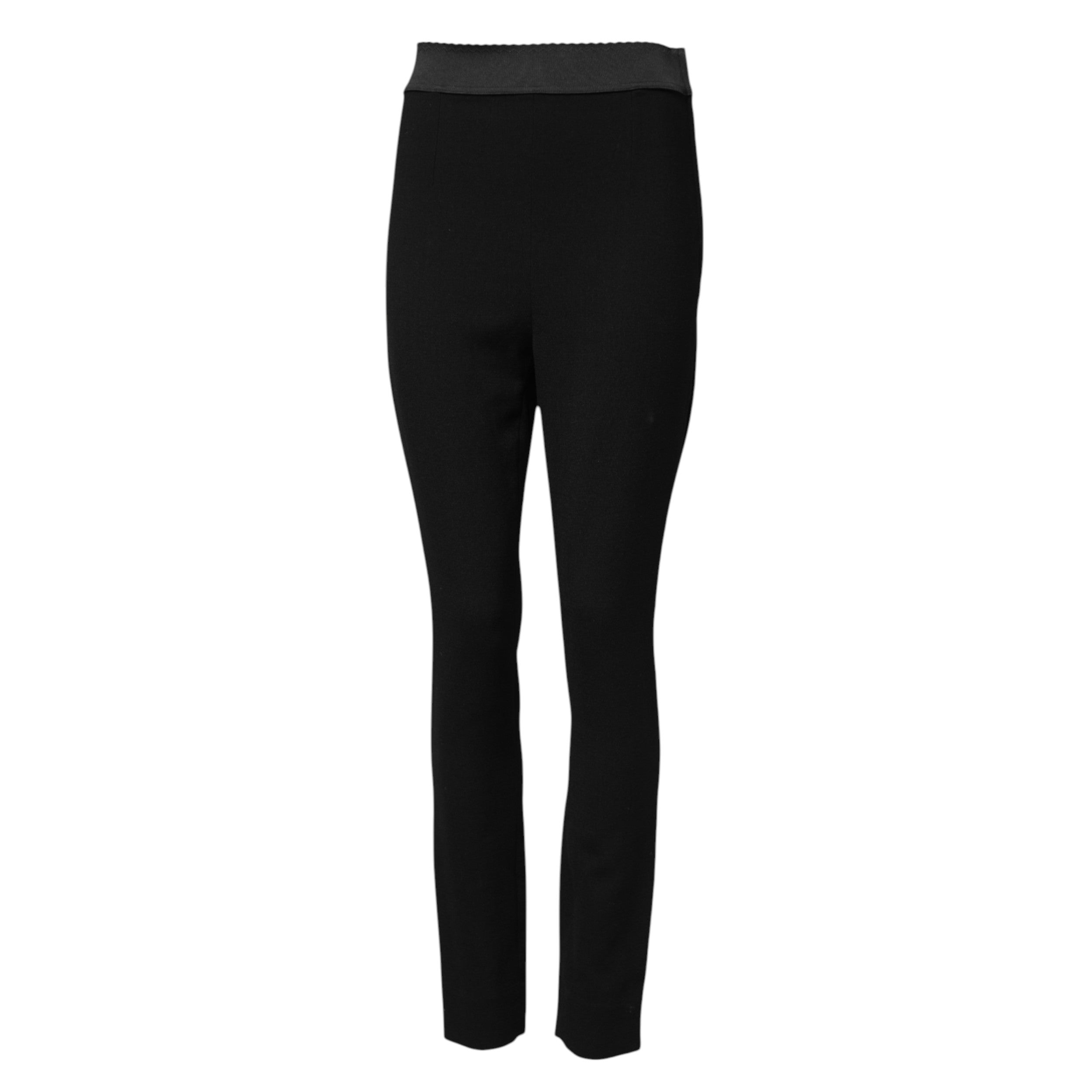 Indulge in the exquisite Dolce & Gabbana Black Wool Leggings, crafted from premium virgin wool for unparalleled elegance and comfort, a timeless addition to elevate your wardrobe.