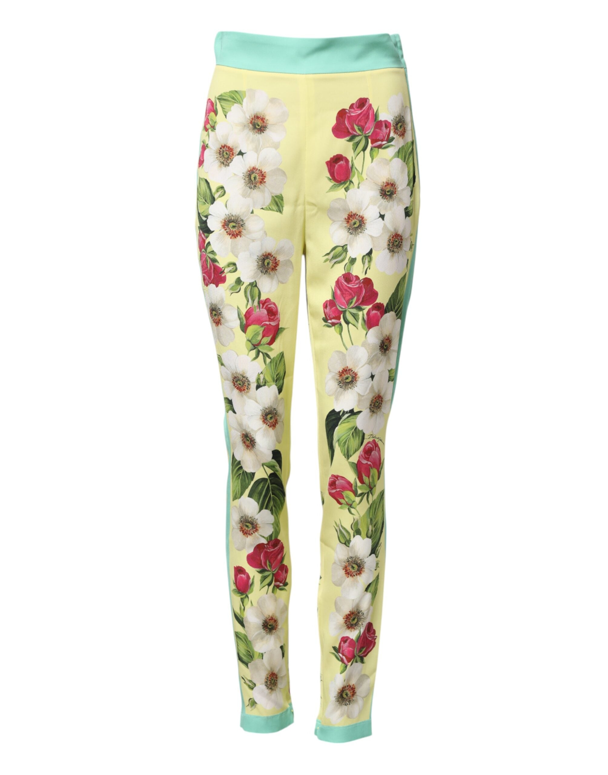 Indulge in the exquisite Dolce & Gabbana Yellow Silk Floral Leggings Pants, where luxurious silk meets Italian craftsmanship for an effortlessly elegant silhouette.