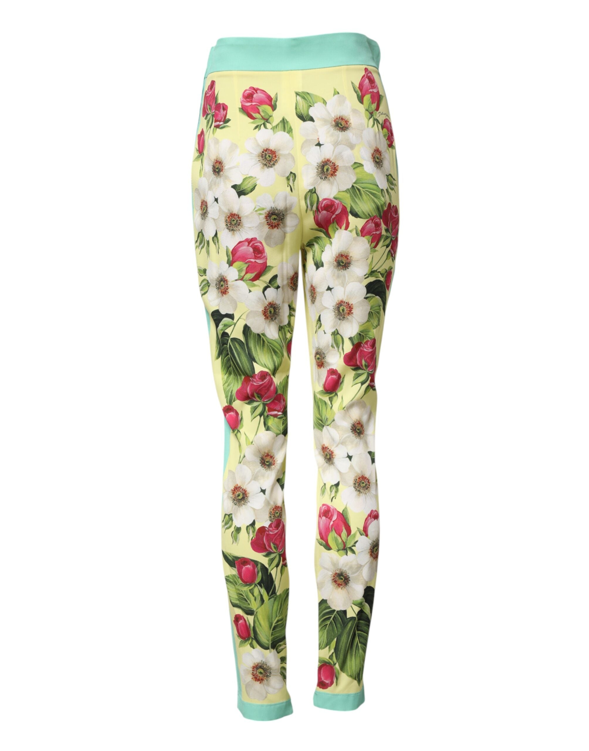 Indulge in the exquisite Dolce & Gabbana Yellow Silk Floral Leggings Pants, where luxurious silk meets vibrant artistry, embodying timeless elegance and effortless allure.