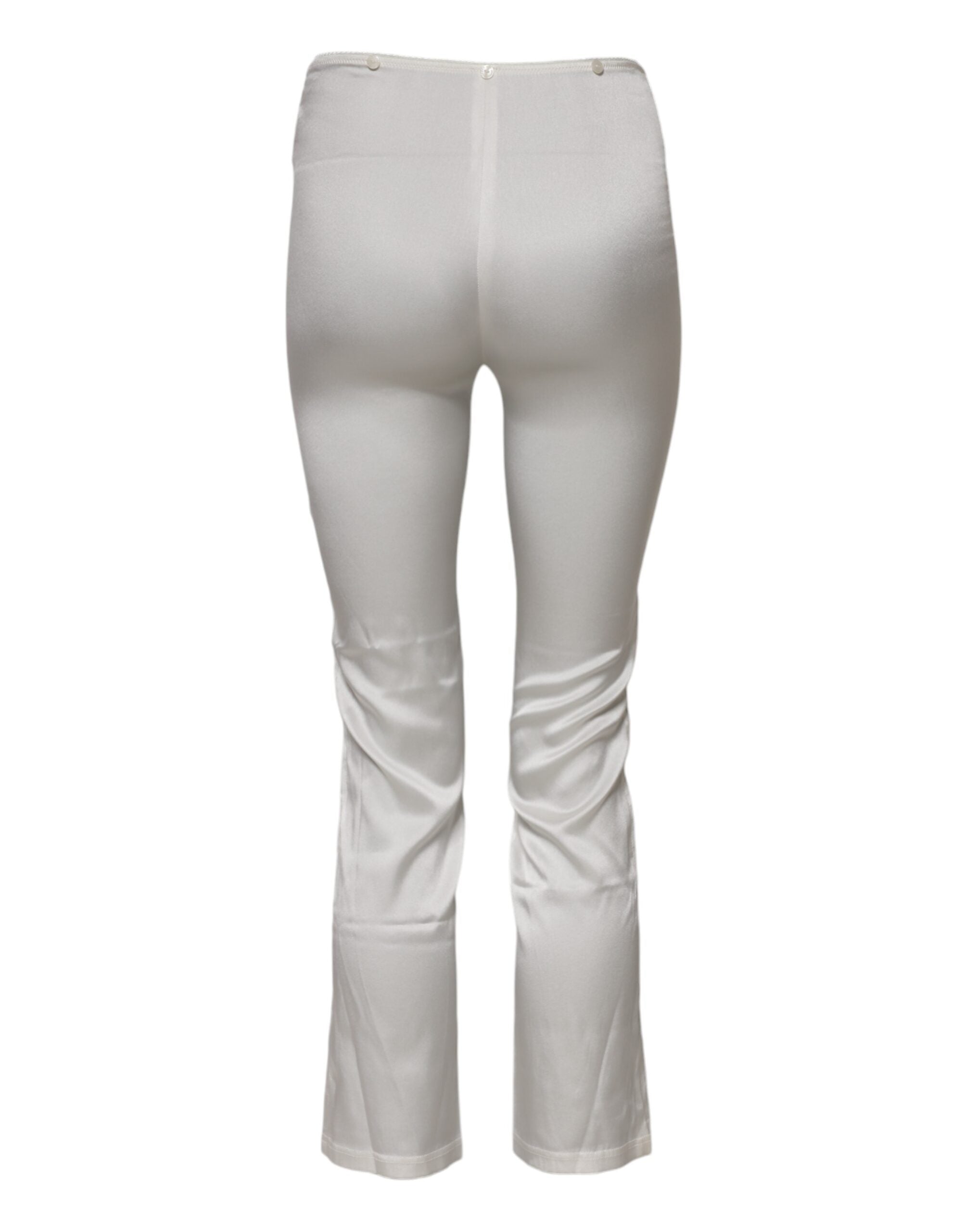Elevate your wardrobe with Dolce & Gabbana's Ivory Silk Tapered High Waist Pants, where exquisite craftsmanship meets timeless elegance, perfect for the discerning individual.