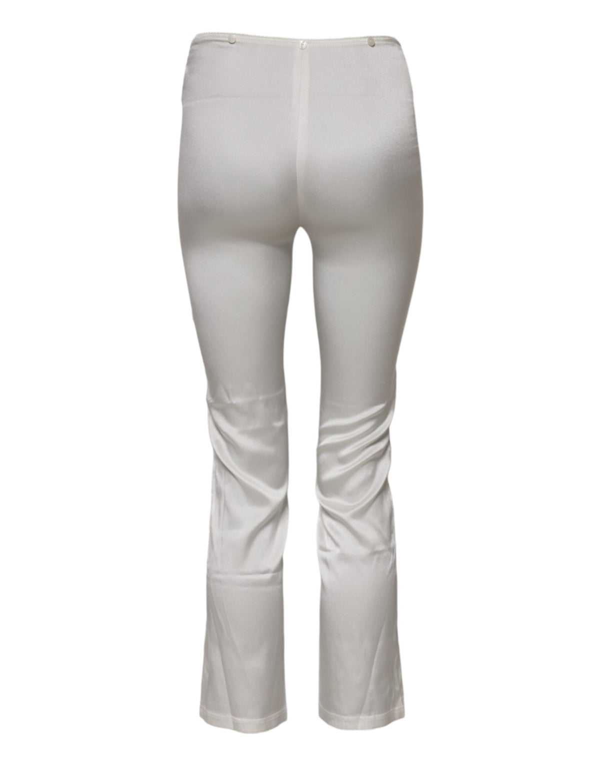 Indulge in the exquisite allure of Dolce & Gabbana's Ivory Silk Tapered High Waist Pants, where luxurious silk meets impeccable craftsmanship for timeless elegance.