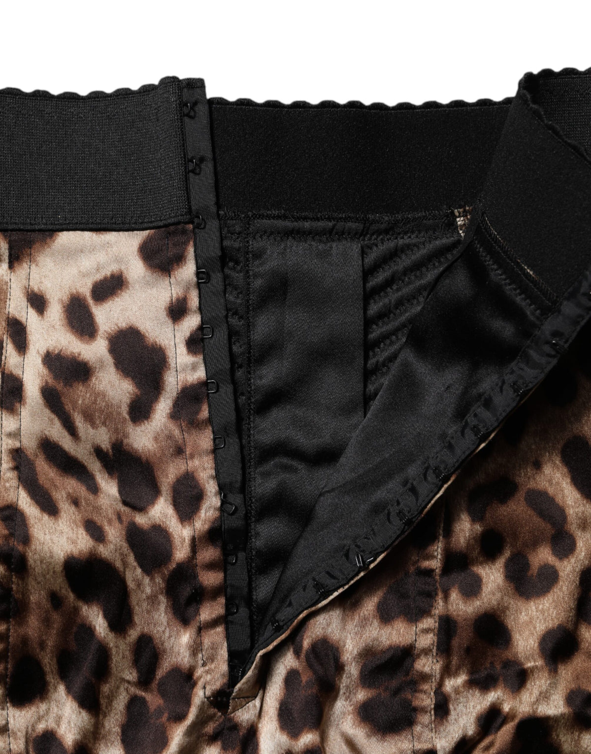 Indulge in the luxurious Dolce & Gabbana Brown Leopard High Waist Hot Pants, a couture masterpiece crafted in Italy from premium materials, embodying elegance and sophistication for the discerning individual.