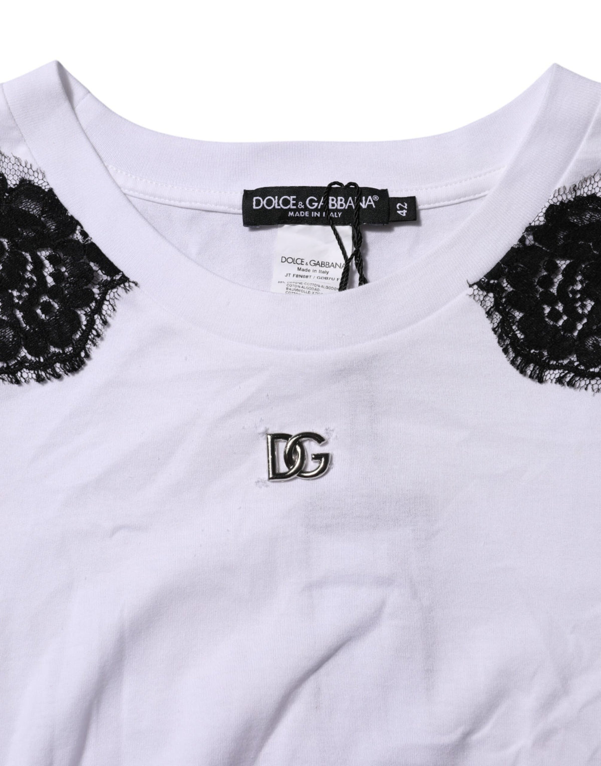 Indulge in the exquisite Dolce & Gabbana White Floral Lace DG Detailing Top, a testament to Italian craftsmanship that elevates your wardrobe with timeless elegance and allure.