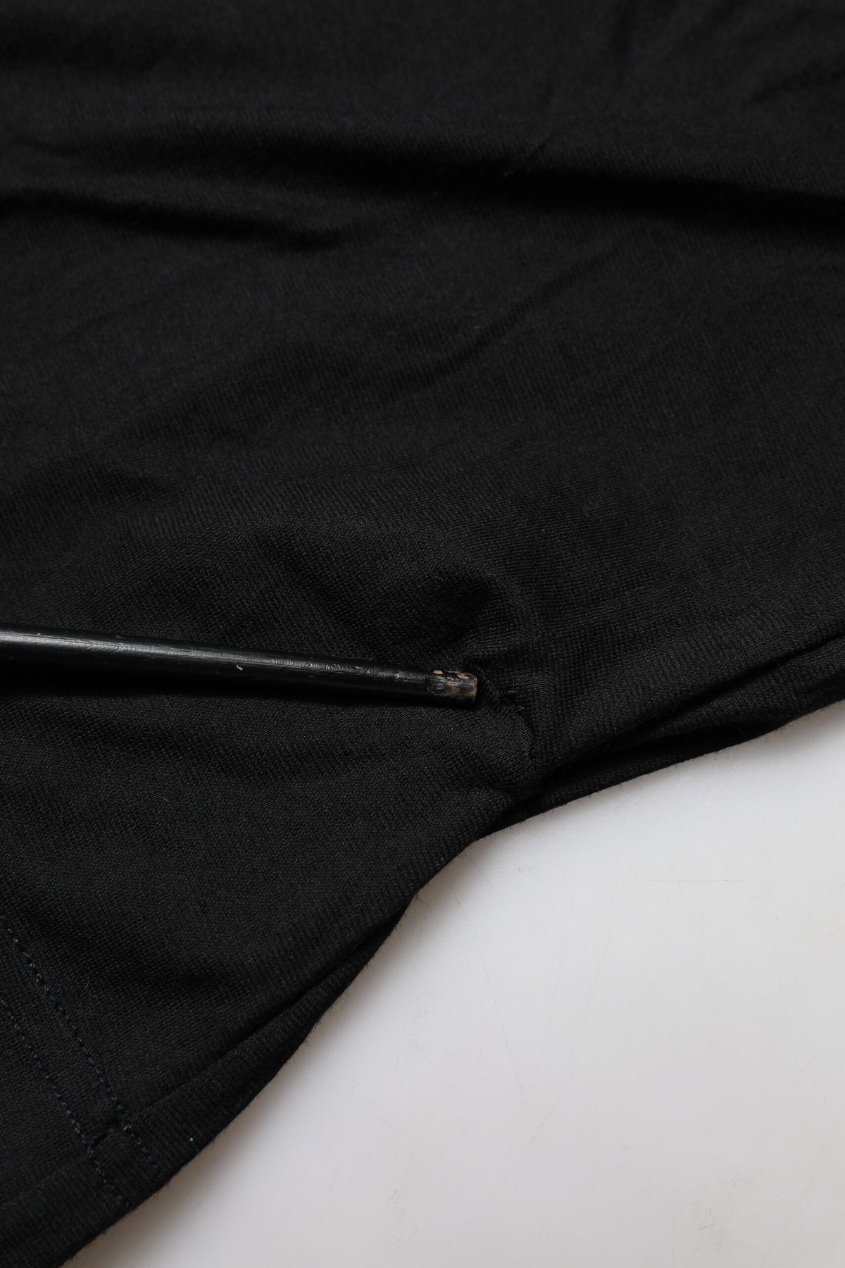 Elevate your wardrobe with the Dolce & Gabbana Black Cotton Short Sleeves T-shirt, a timeless piece of Italian craftsmanship that embodies luxury and individuality.