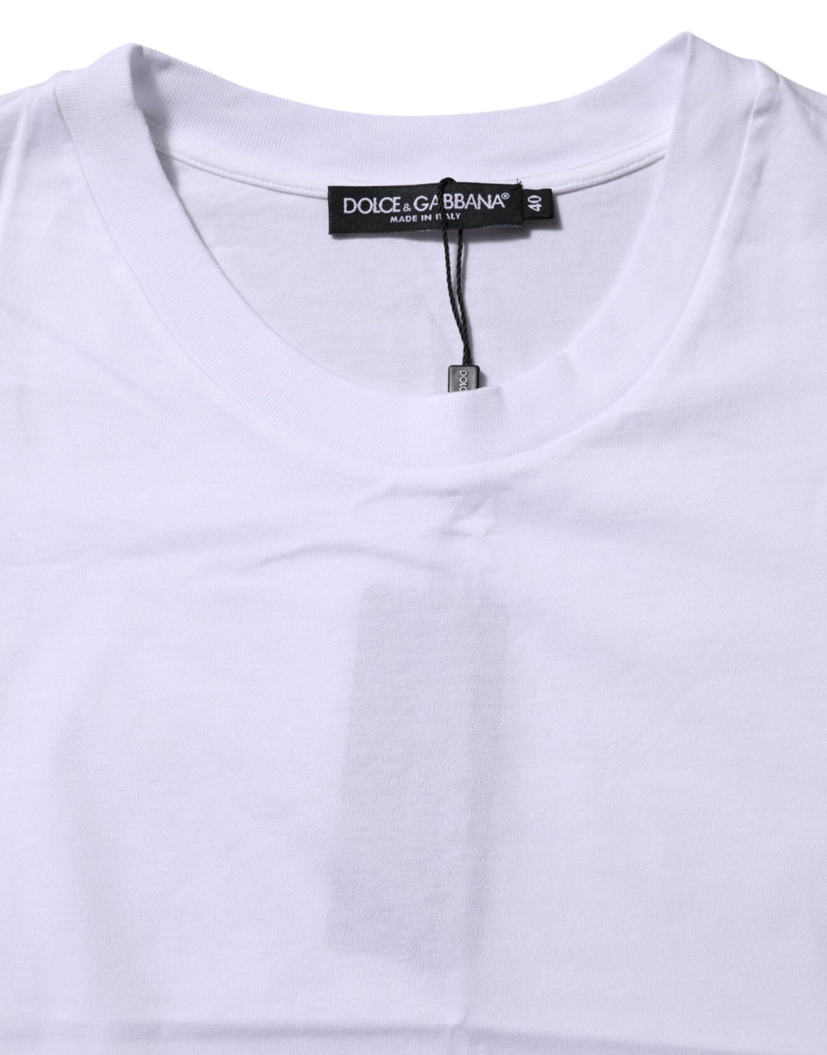 Discover the Dolce & Gabbana White Cotton Round Neck Short Sleeves T-shirt, a symbol of Italian craftsmanship and timeless elegance, perfect for the discerning individual.