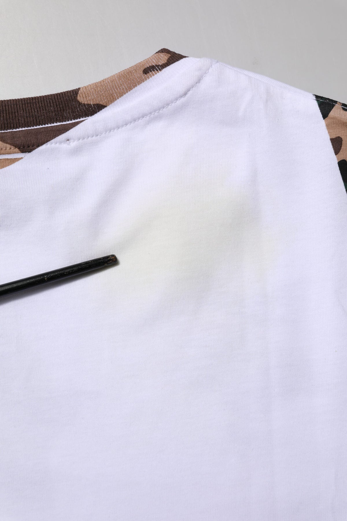 Indulge in the exquisite Dolce & Gabbana White Camouflage Cotton Men Crew Neck T-shirt, a luxurious blend of comfort and style, crafted in Italy for the discerning individual.