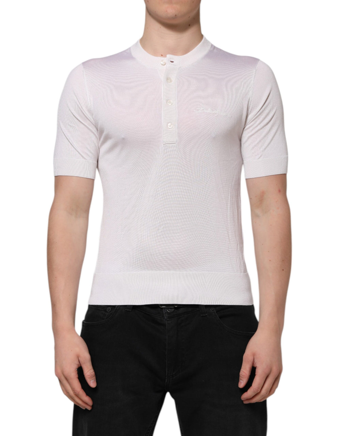 Elevate your wardrobe with the Dolce & Gabbana White Silk Henley T-shirt, a masterpiece of Italian craftsmanship that embodies timeless elegance and luxurious comfort.