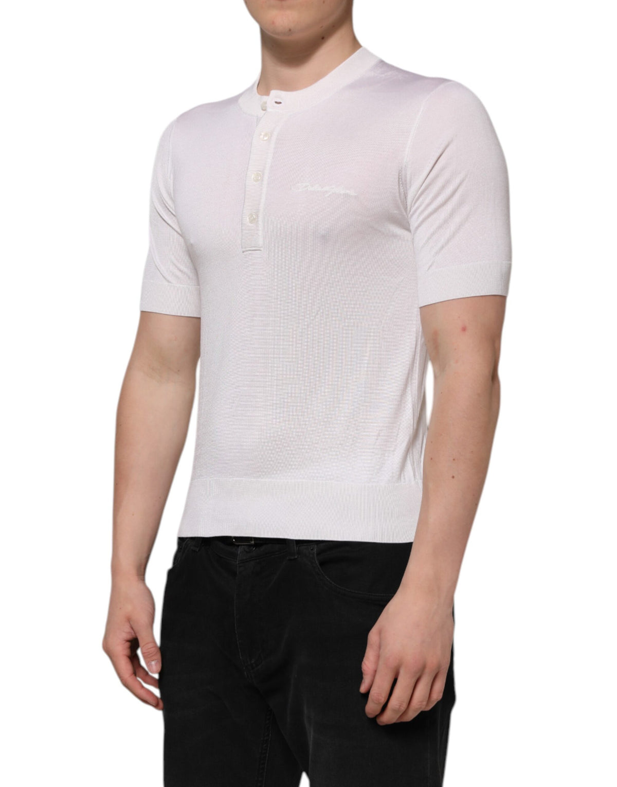 Elevate your wardrobe with the Dolce & Gabbana White Silk Short Sleeves Henley T-shirt, a symbol of Italian craftsmanship and timeless elegance, perfect for any occasion.