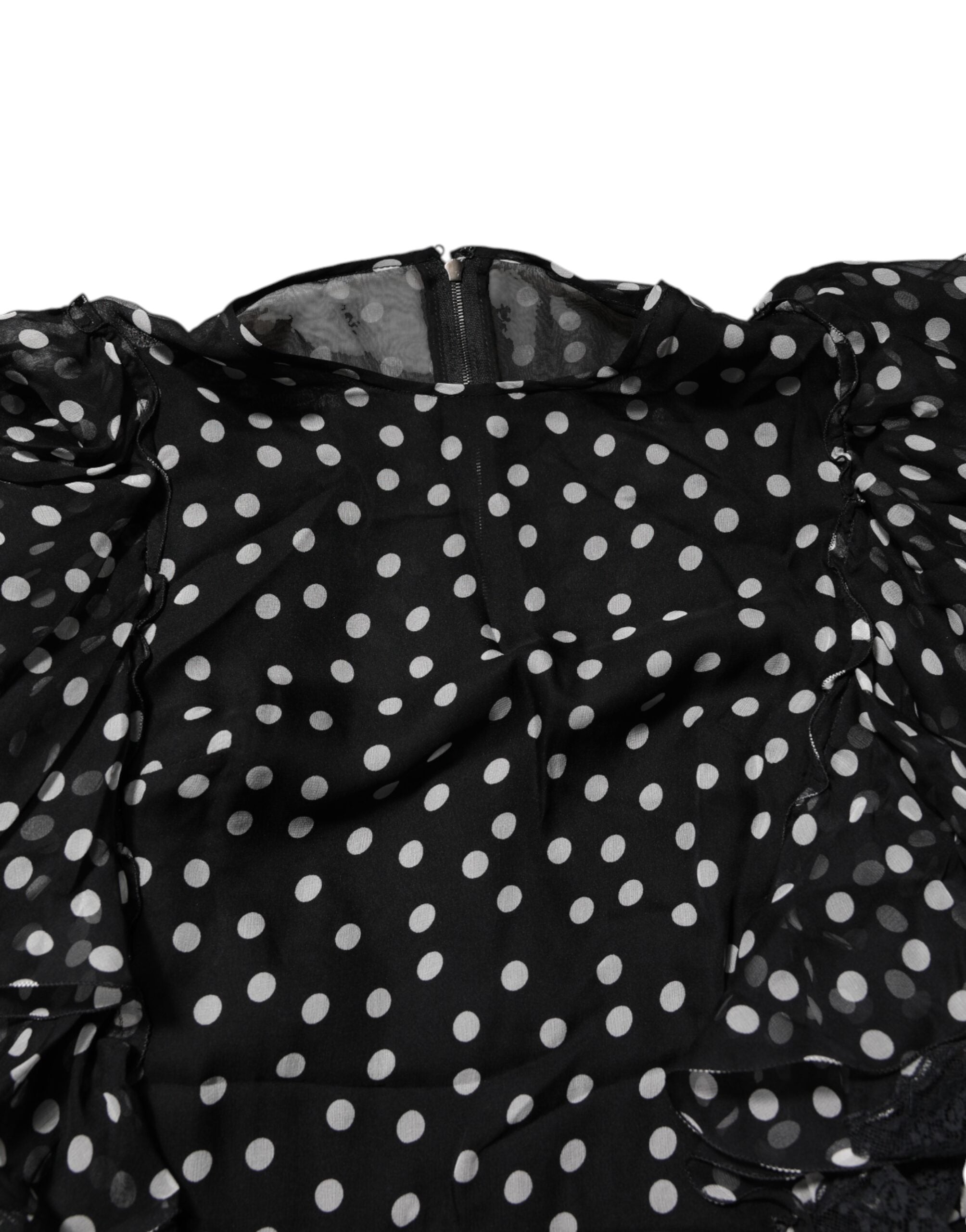 Indulge in the exquisite Dolce & Gabbana Black White Lace Polka Dot Chiffon Dress, a timeless masterpiece of silk and cotton that embodies elegance and allure.