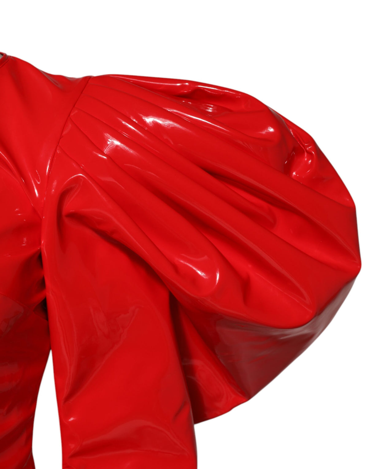 Indulge in the exquisite allure of the Dolce & Gabbana Red Patent Leather Puff Sleeves Mini Dress, a statement of timeless elegance and Italian craftsmanship for the discerning fashionista.
