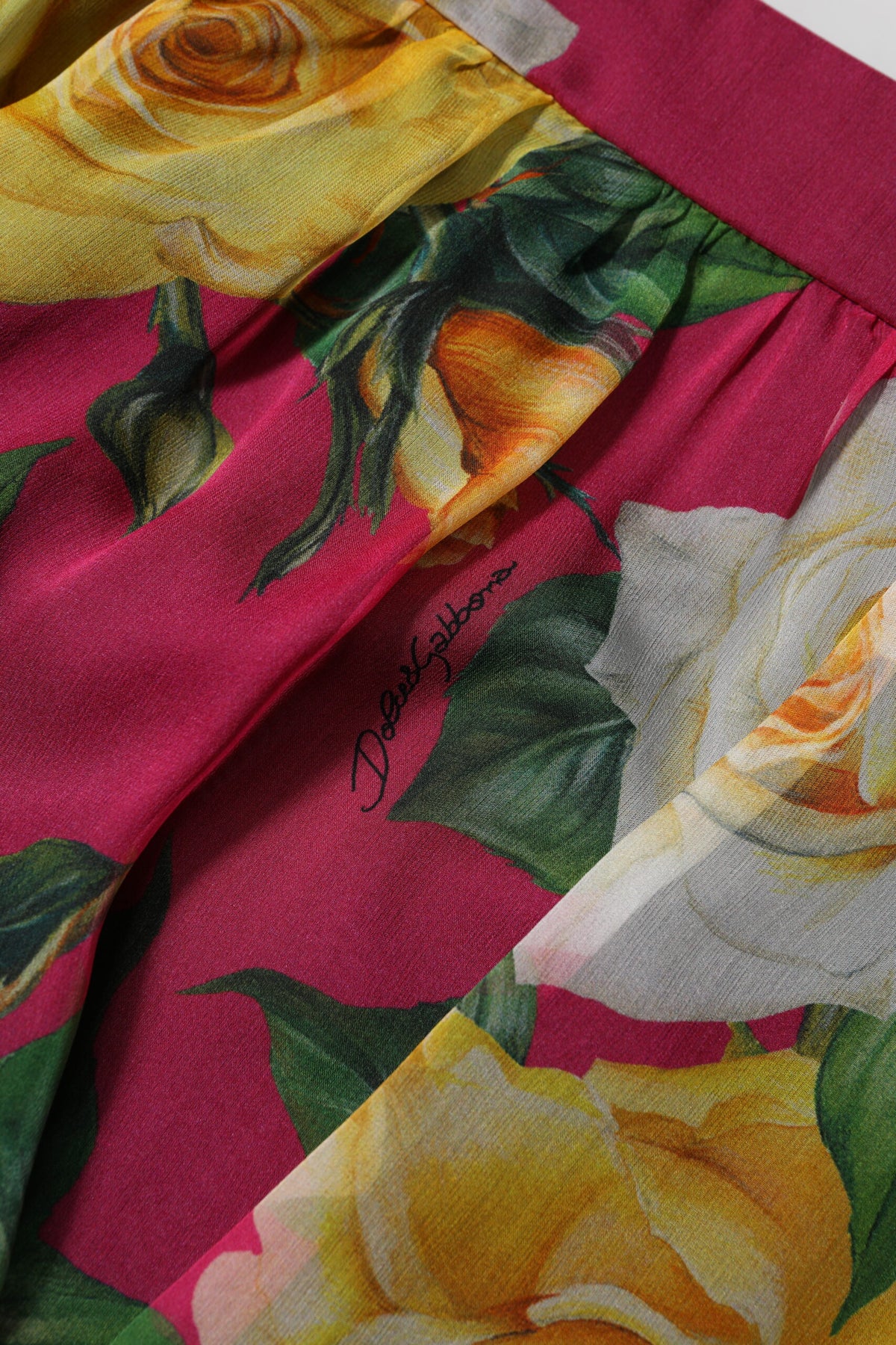 Experience the allure of Dolce & Gabbana's Red Floral High Waist Silk Hot Pants, where exquisite craftsmanship meets luxurious silk for timeless elegance and sophistication.