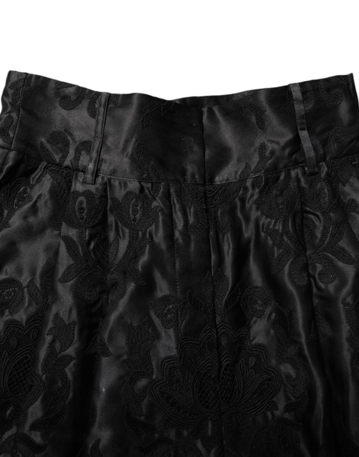 Indulge in the exquisite Dolce & Gabbana Black Floral Embroidery Silk High Waist Shorts, where luxurious silk meets meticulous craftsmanship for timeless elegance.