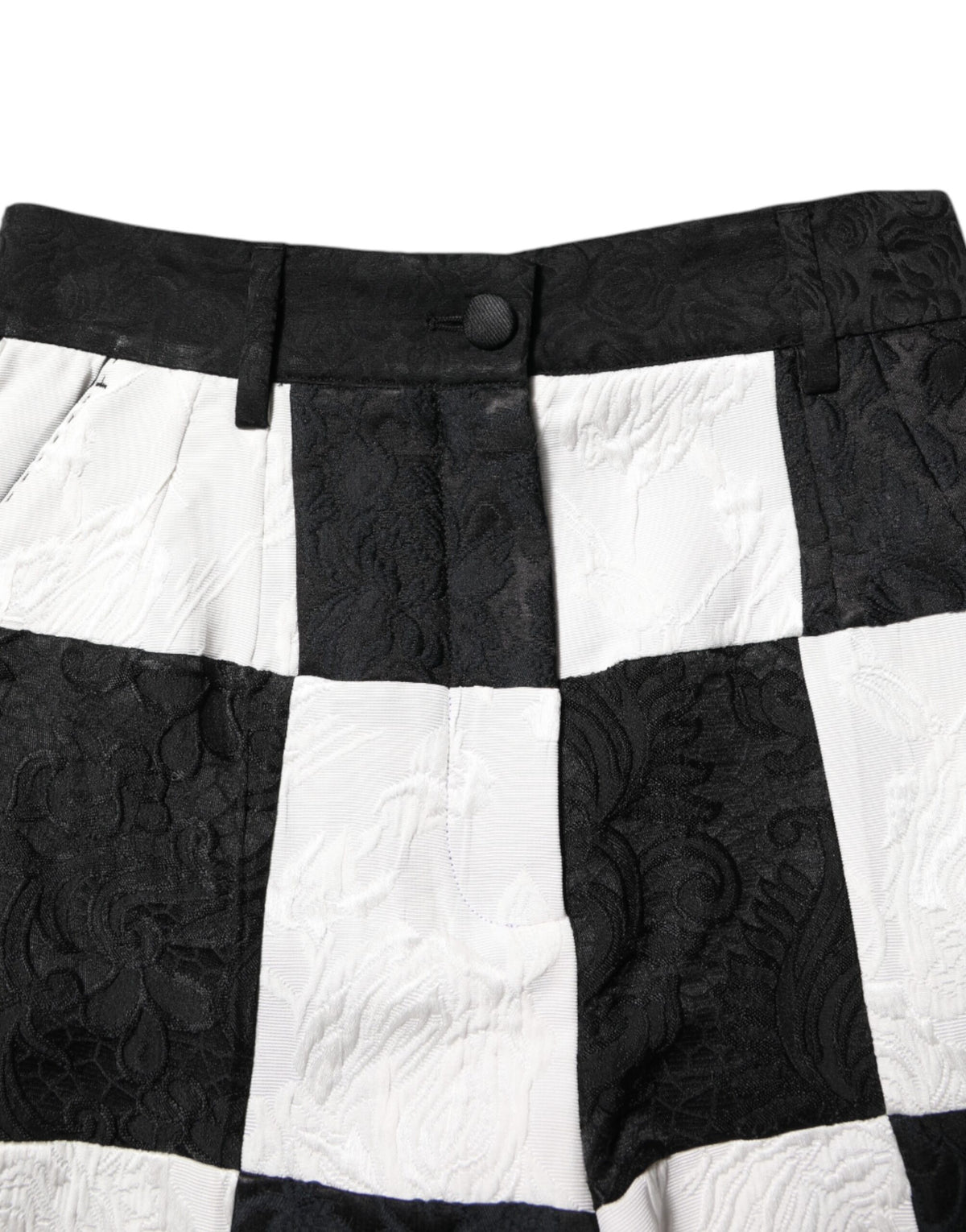 Indulge in the exquisite Dolce & Gabbana Black White Floral Brocade Hot Pants, a hallmark of haute couture elegance, crafted from luxurious materials for an unforgettable silhouette.