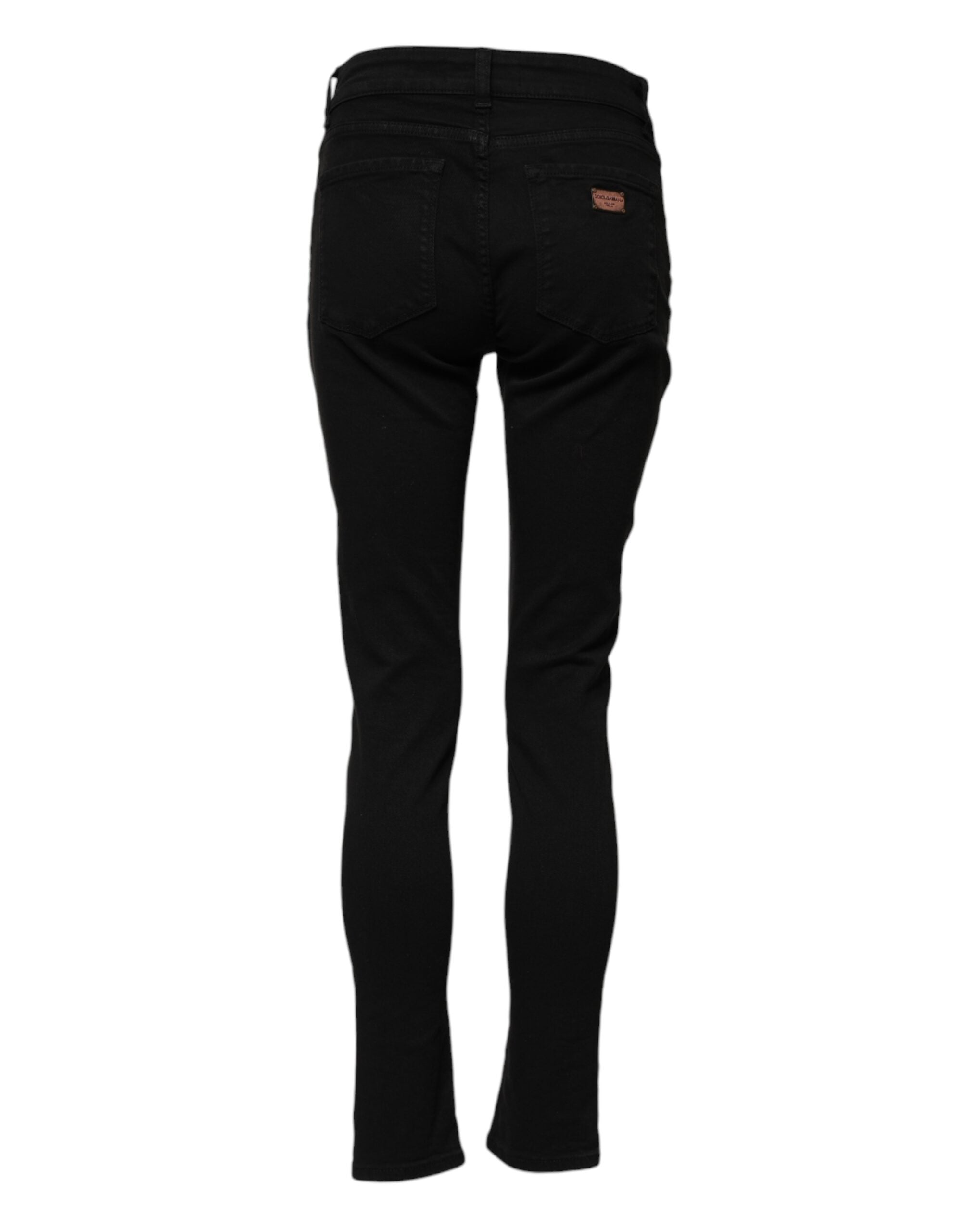 Elevate your wardrobe with Dolce & Gabbana's Black Cotton Logo Skinny Mid Waist Denim Jeans, a testament to Italian craftsmanship and timeless elegance, perfect for the discerning individual.