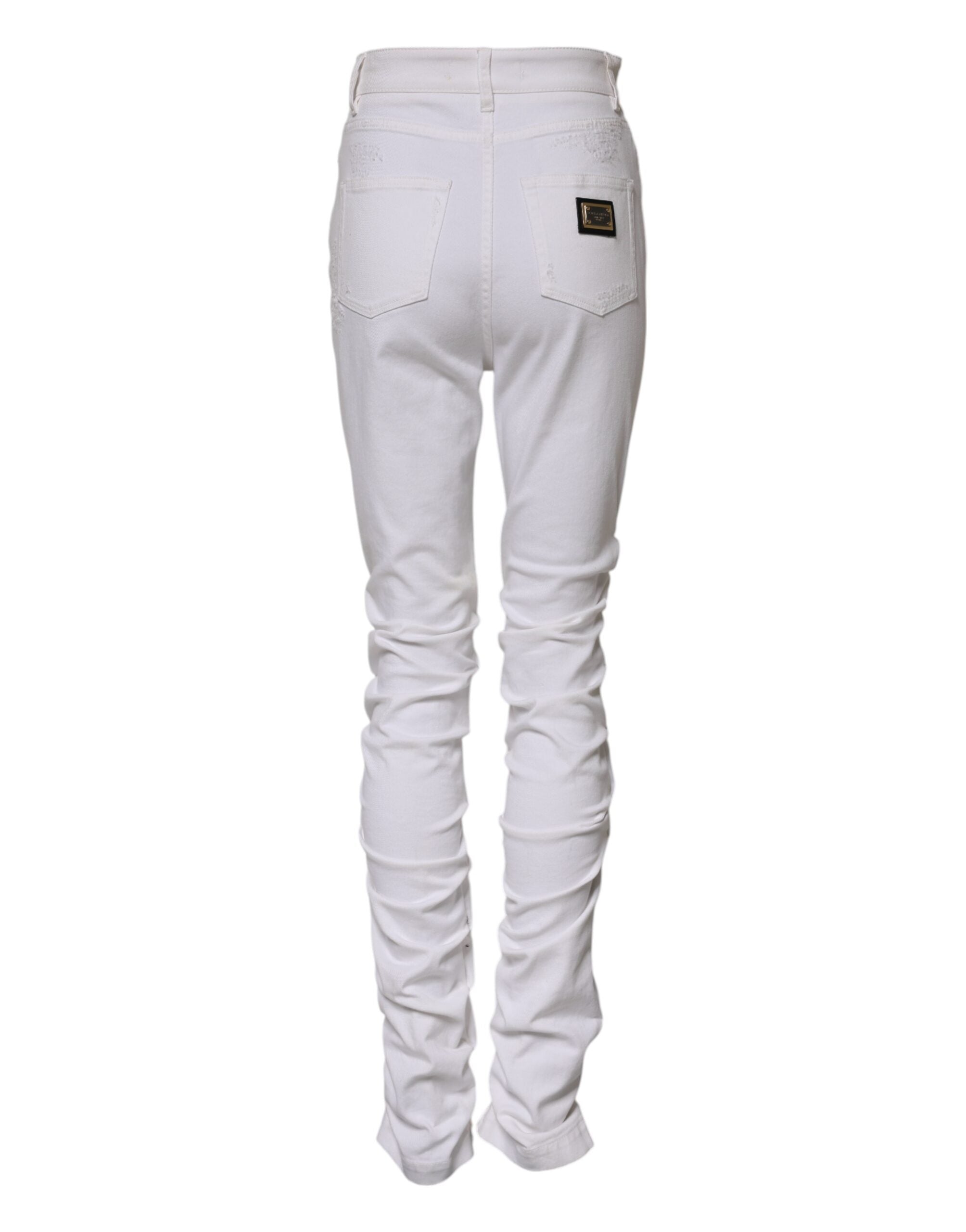 Indulge in the exquisite artistry of Dolce & Gabbana's White Tattered High Waist Denim Jeans, crafted from premium cotton for a luxurious fit that elevates your style.