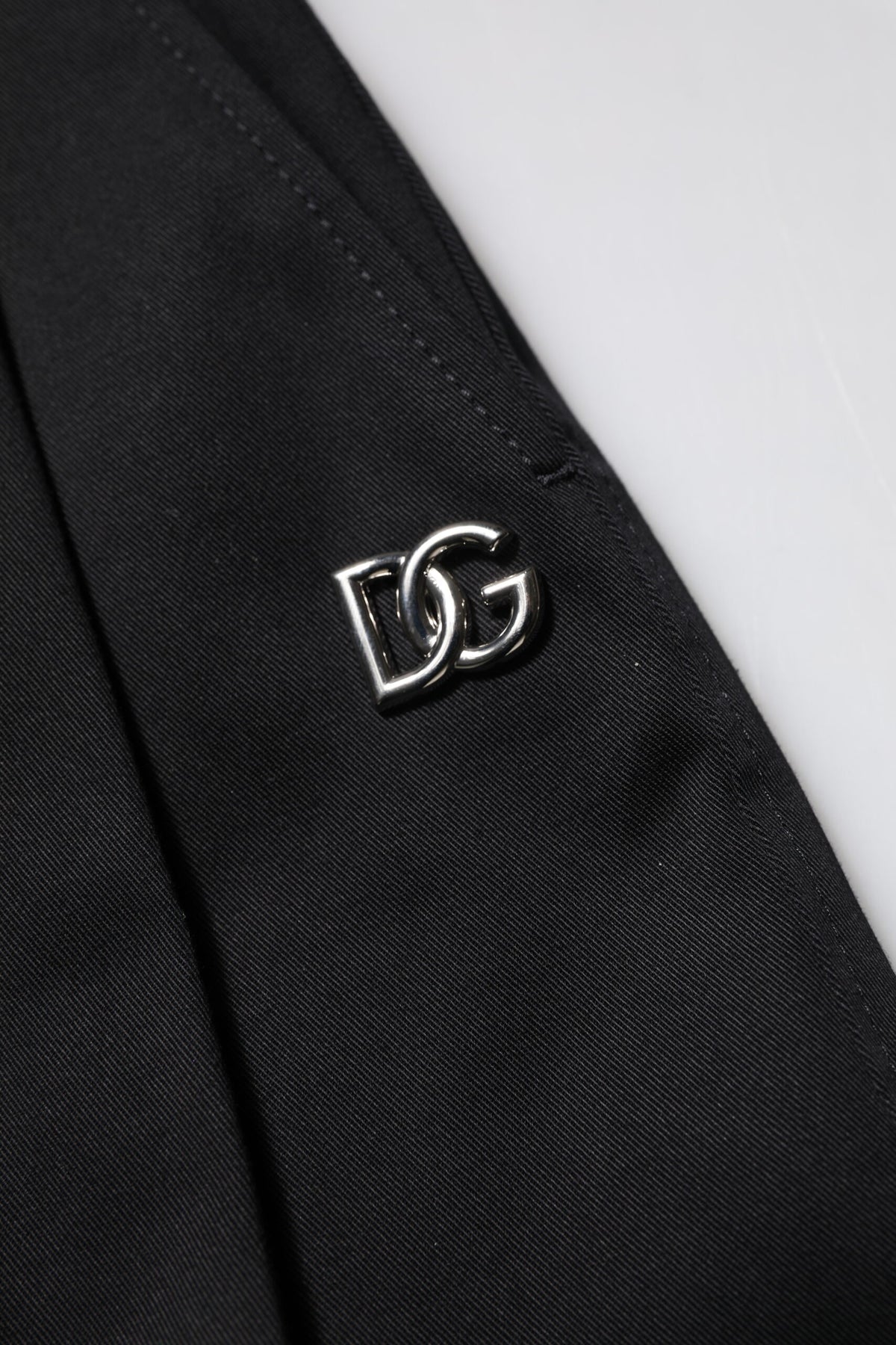 Experience the allure of Dolce & Gabbana's Black Cotton HighWaist Wide Leg Pants, where exquisite craftsmanship meets luxurious comfort for an effortlessly chic silhouette.