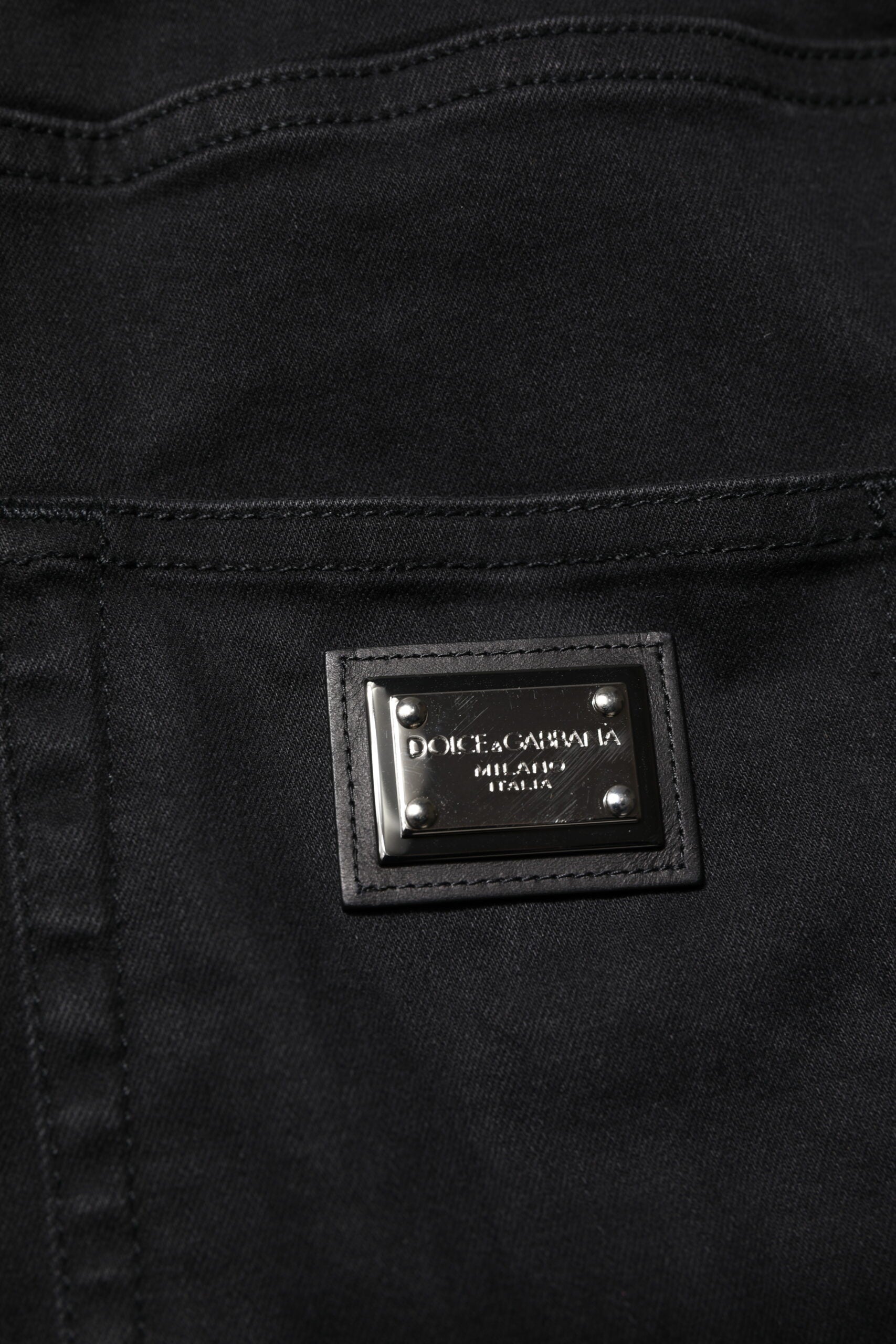 Indulge in the exquisite craftsmanship of Dolce & Gabbana's Black Cotton High Waist Skinny Denim Jeans, where timeless elegance meets modern allure for the discerning individual.