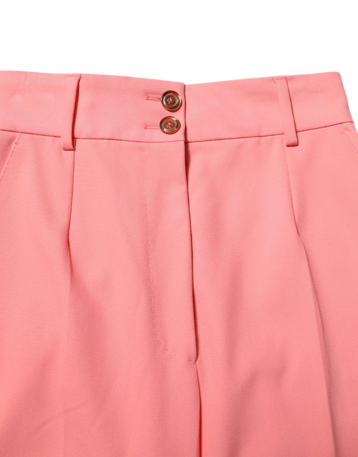 Experience the allure of Dolce & Gabbana's Pink High Waist Tapered Dress Pants, crafted from a luxurious blend, embodying timeless elegance and Italian craftsmanship.