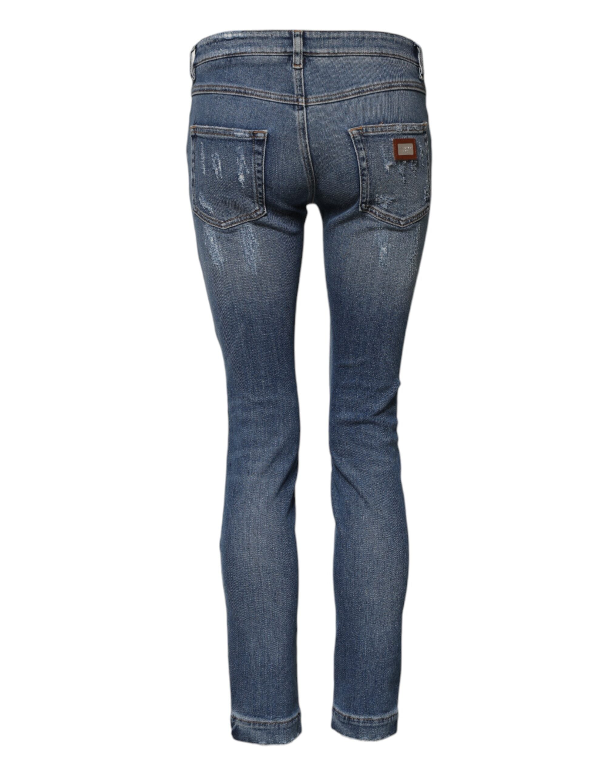 Indulge in the exquisite Dolce & Gabbana Blue PRETTY Tattered Skinny Denim Jeans, where Italian craftsmanship meets modern elegance for a timeless statement of luxury.