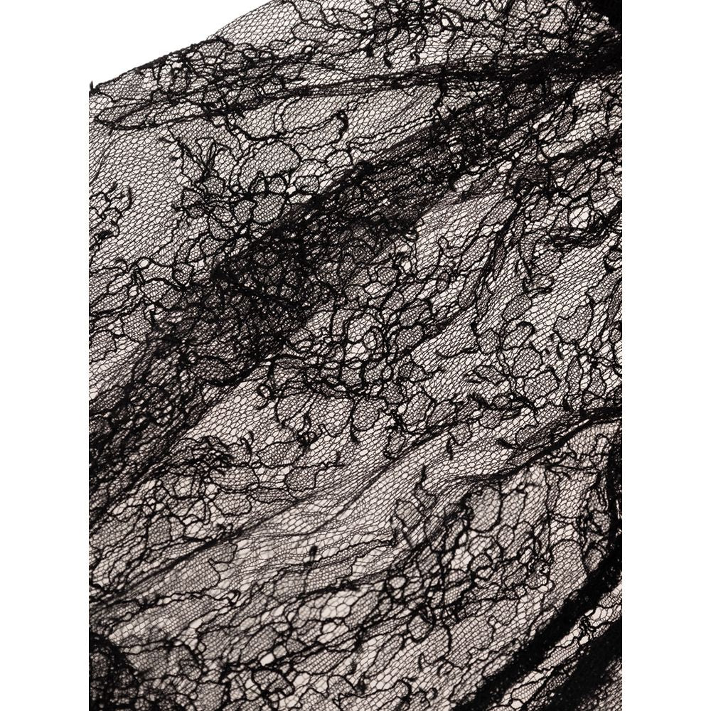 Discover the Tom Ford Black Polyamide Top, a luxurious blend of lace and comfort, perfect for elevating your style with timeless elegance and sophistication.