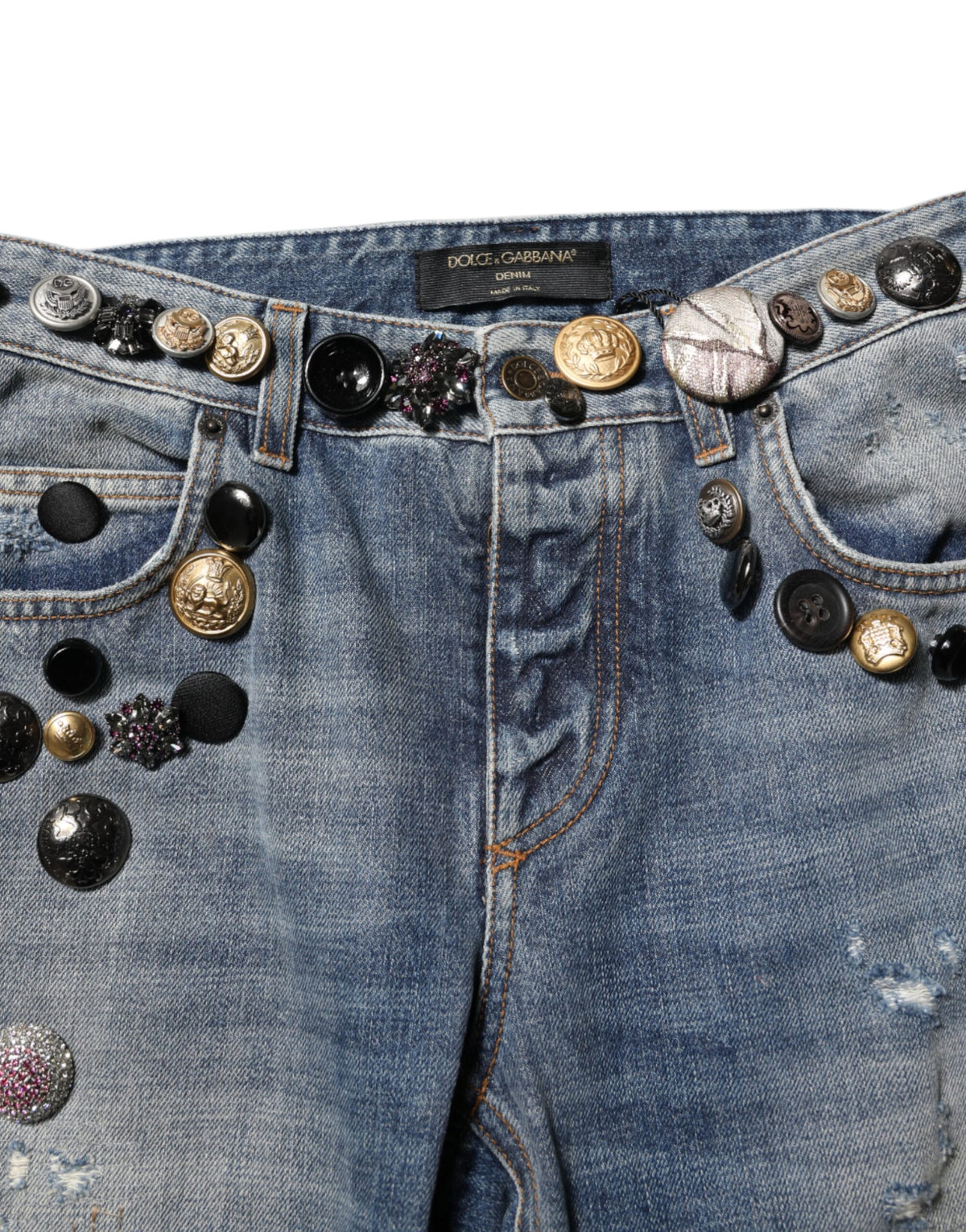 Elevate your style with Dolce & Gabbana's Blue Embellished Tattered Skinny Denim Jeans, a luxurious blend of Italian craftsmanship and modern elegance, perfect for the discerning fashion connoisseur.