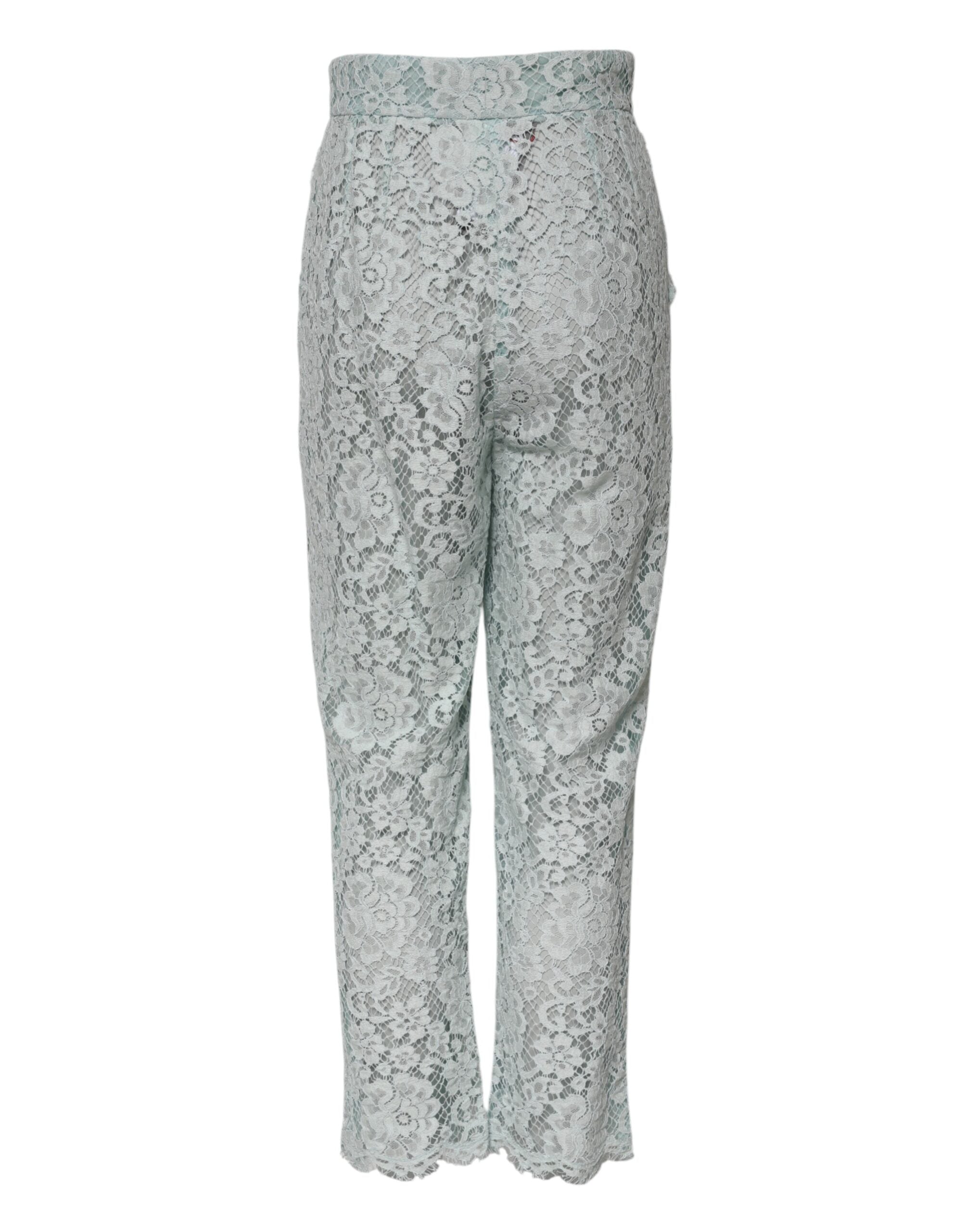 Discover the Dolce & Gabbana Mint Green Cotton Floral Lace Trousers, where exquisite craftsmanship meets timeless elegance, perfect for the discerning individual.