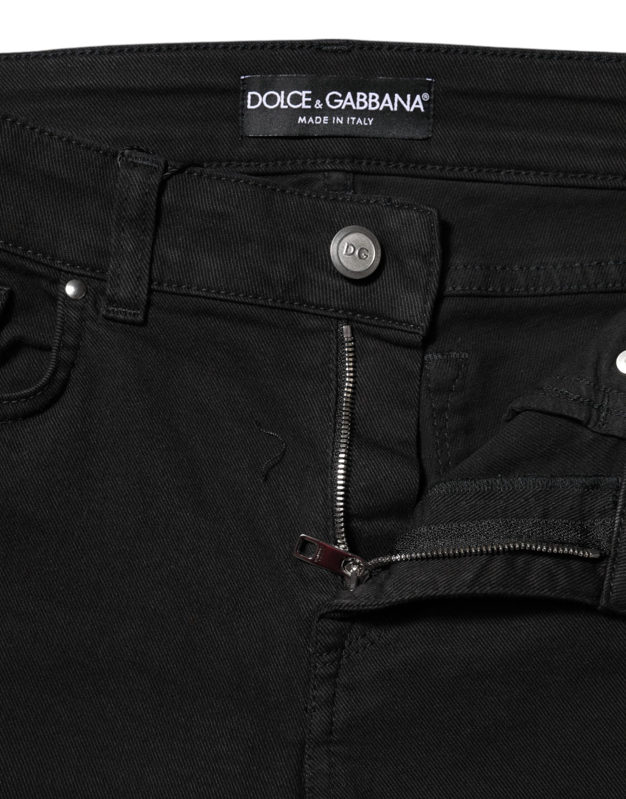 Elevate your wardrobe with Dolce & Gabbana's Black Cotton Logo Skinny MidWaist Denim Jeans, where exquisite craftsmanship meets luxurious comfort for the discerning individual.