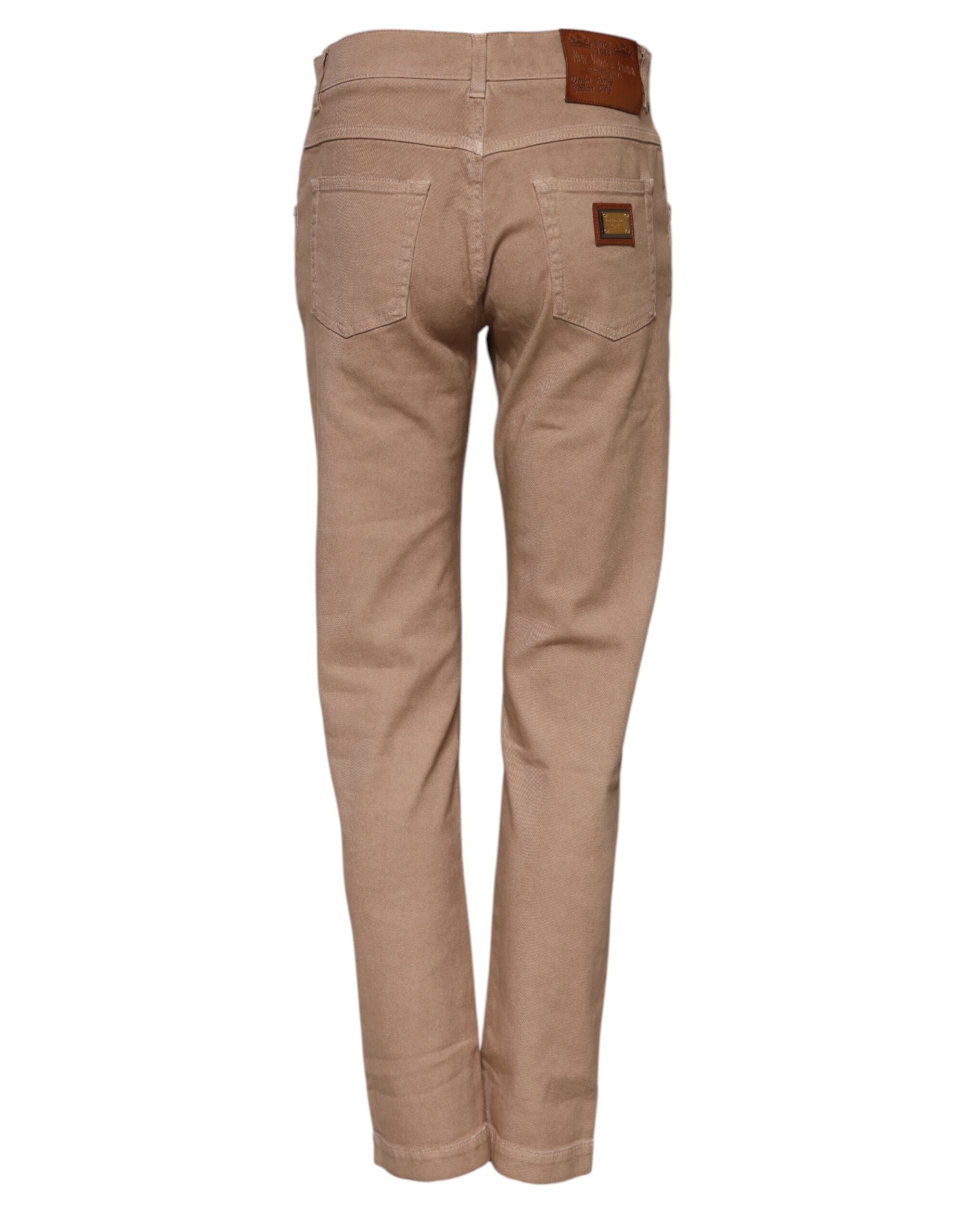 Indulge in the luxurious Dolce & Gabbana Brown Cotton Boyfriend Denim Trousers, where exquisite Italian craftsmanship meets timeless elegance for the discerning individual.