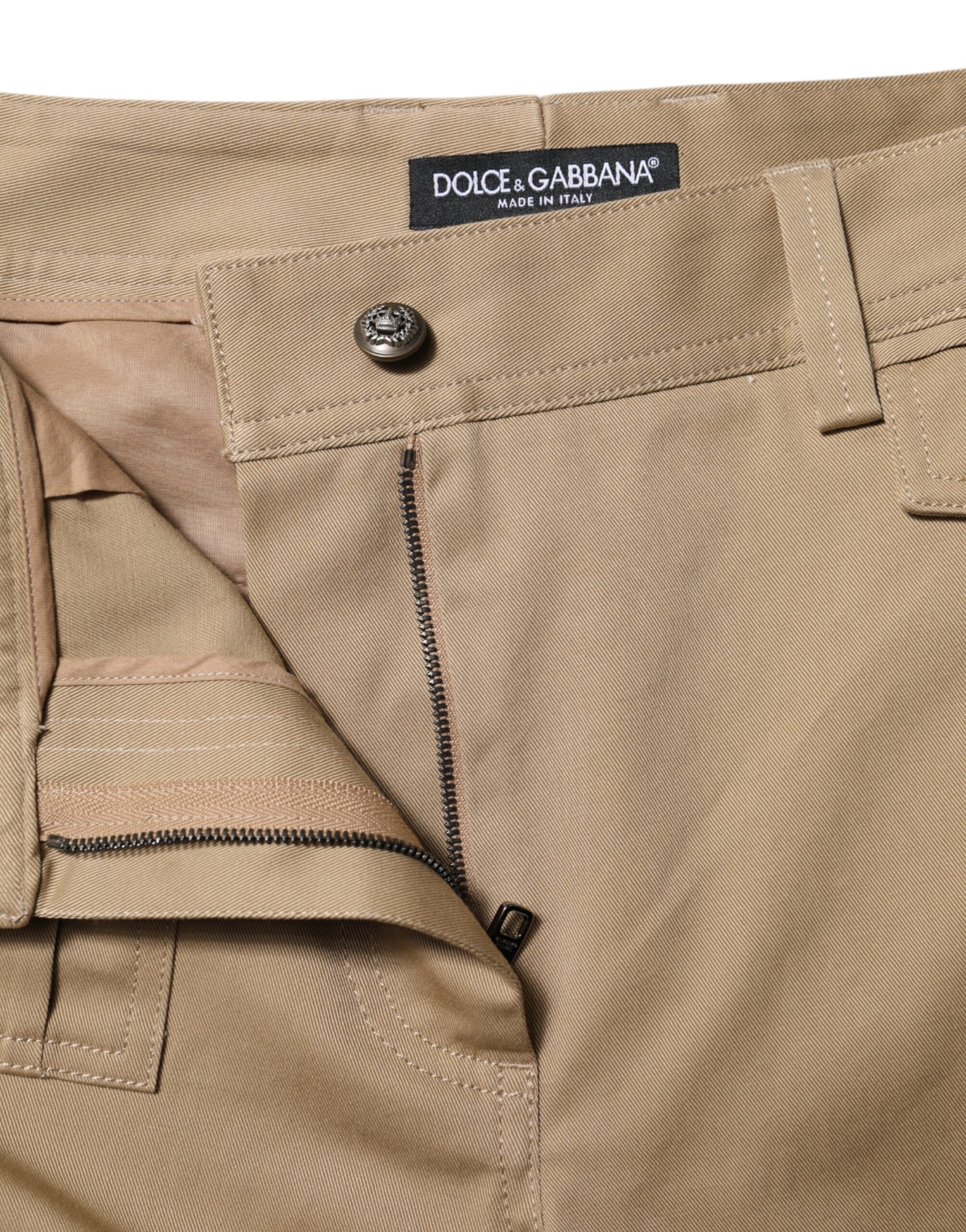 Elevate your wardrobe with Dolce & Gabbana's Beige Mid Waist Cargo Tapered Pants, crafted from luxurious cotton and elastane, embodying Italian artistry and timeless elegance.