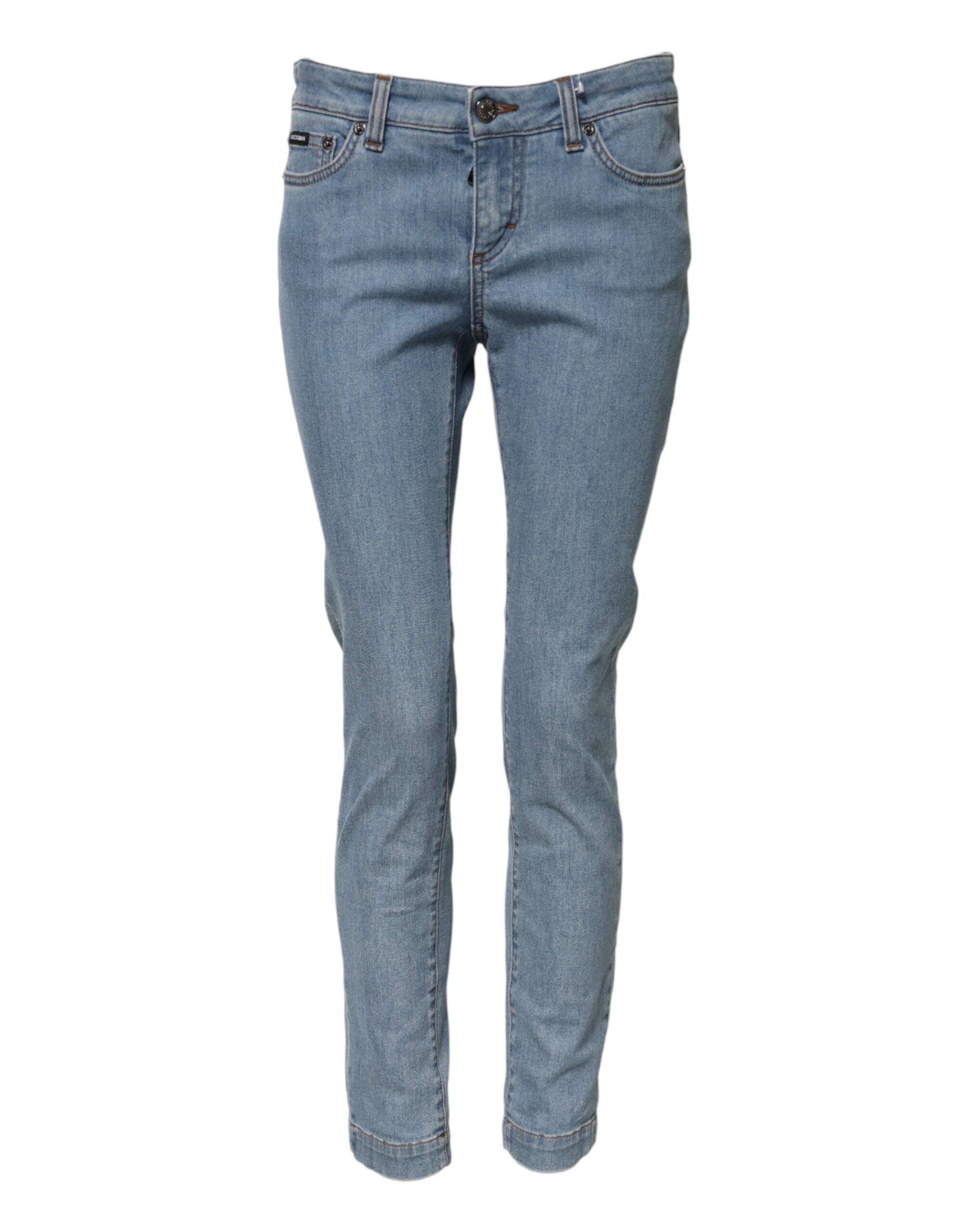 Elevate your style with Dolce & Gabbana's Blue Cotton PRETTY MidWaist Skinny Denim Jeans, a luxurious blend of comfort and elegance, crafted in Italy for the discerning individual.