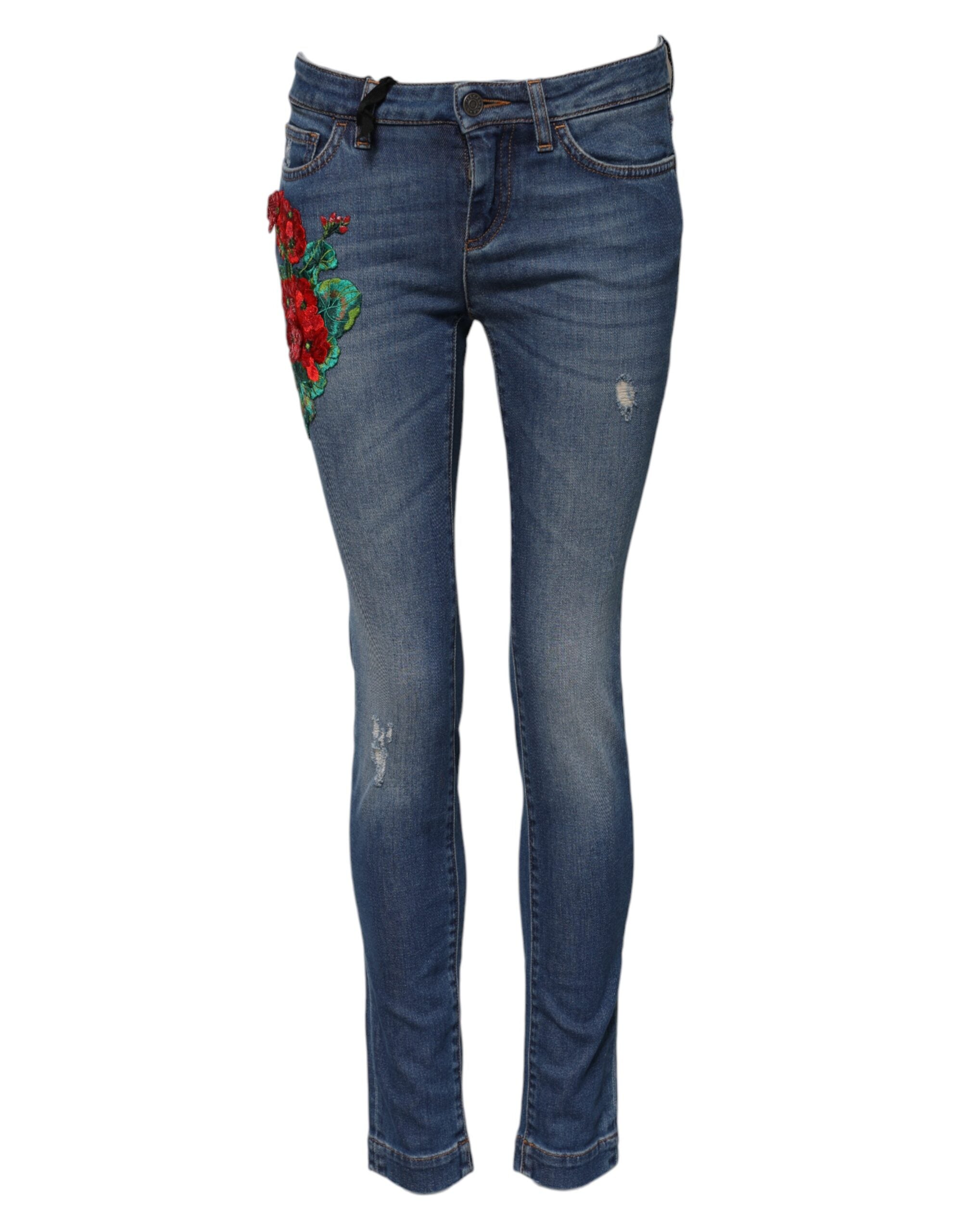 Indulge in the exquisite Dolce & Gabbana Blue Cotton Low Waist Skinny Denim Jeans, where Italian craftsmanship meets luxurious floral embroidery, elevating your style to new heights.