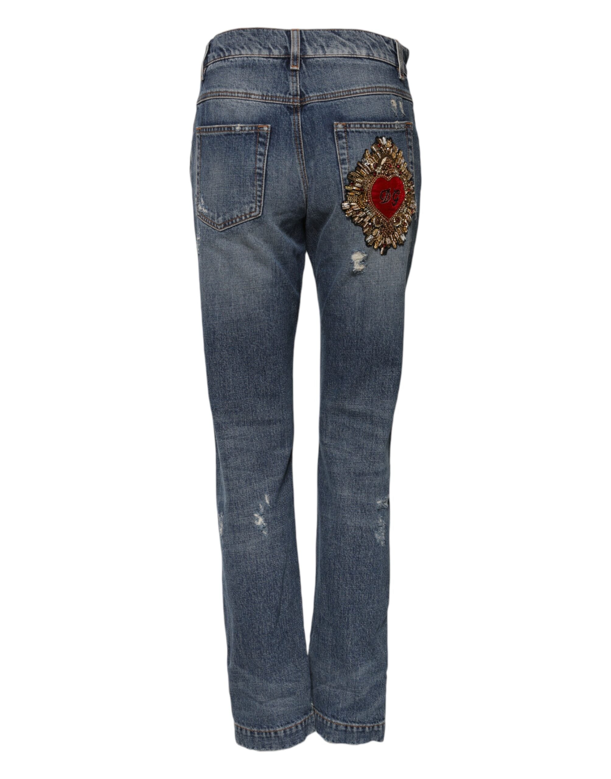 Elevate your style with Dolce & Gabbana's Blue Cotton Boyfriend Tattered Denim Jeans, a luxurious blend of comfort and chic sophistication, crafted in Italy.
