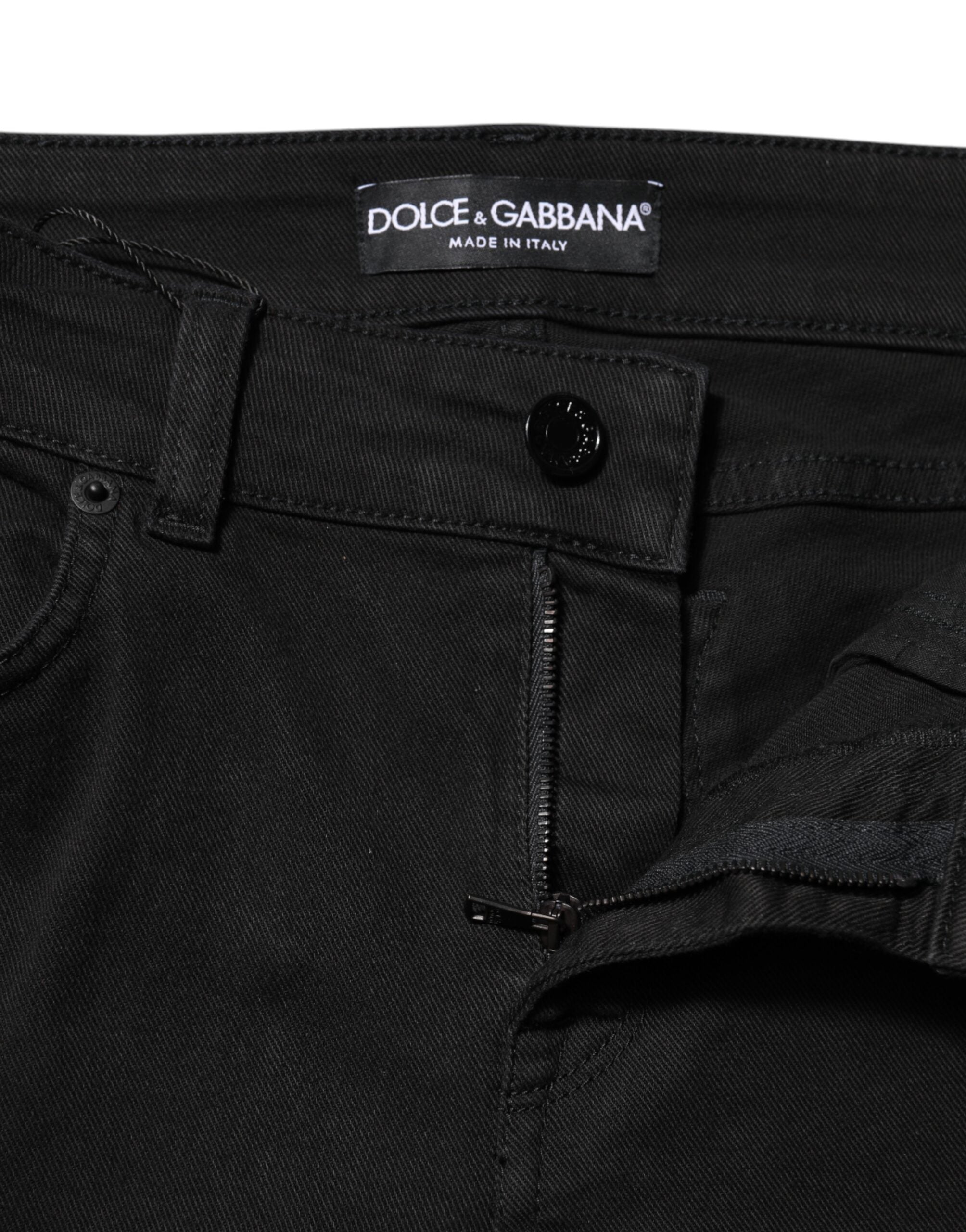 Indulge in the exquisite allure of Dolce & Gabbana Black Cotton Skinny Mid Waist Denim Jeans, where luxurious craftsmanship meets timeless elegance, perfect for any occasion.