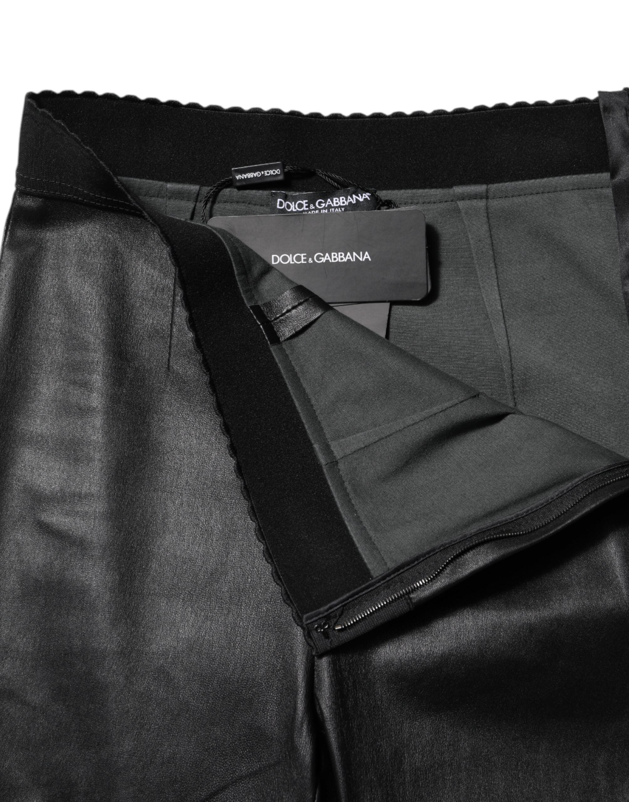 Experience the exquisite allure of Dolce & Gabbana's black leather elastic waist pants, crafted from premium lambskin for a silhouette that embodies elegance and confidence.
