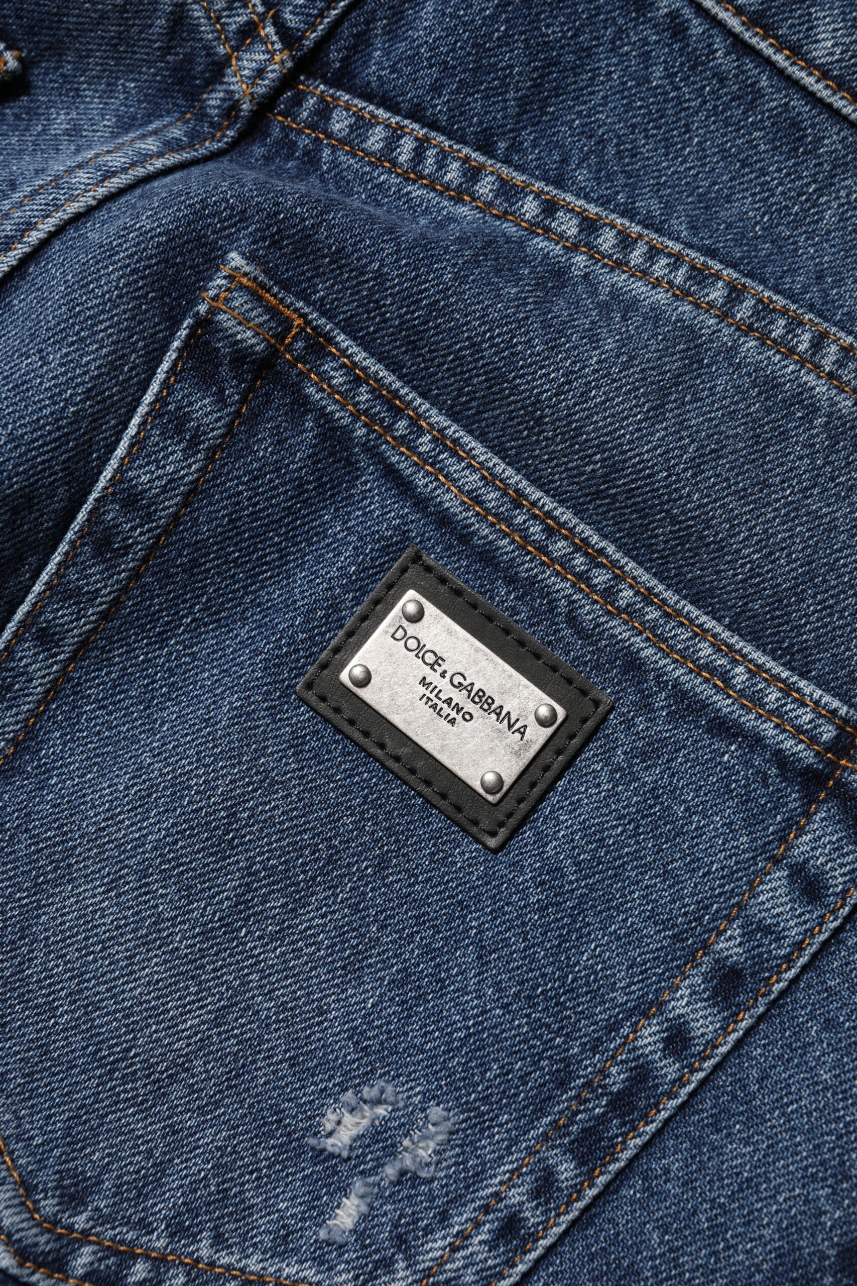 Indulge in the exquisite Dolce & Gabbana Blue Cotton Wide Leg Tattered Denim Jeans, where Italian craftsmanship meets luxurious comfort, elevating your style effortlessly.