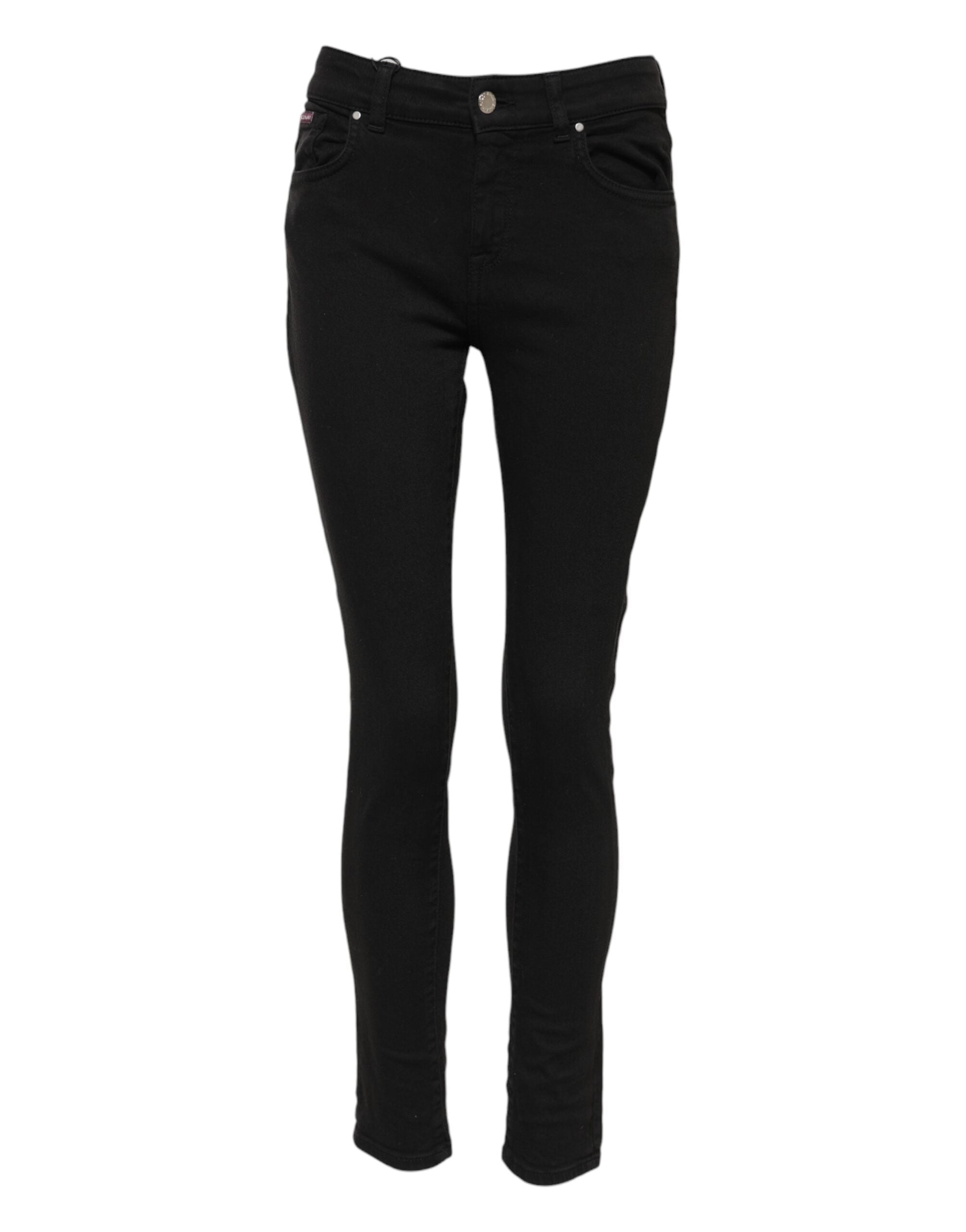 Indulge in the exquisite luxury of Dolce & Gabbana's Black Cotton Logo Skinny Mid Waist Denim Jeans, where Italian craftsmanship meets timeless elegance for the discerning fashion lover.