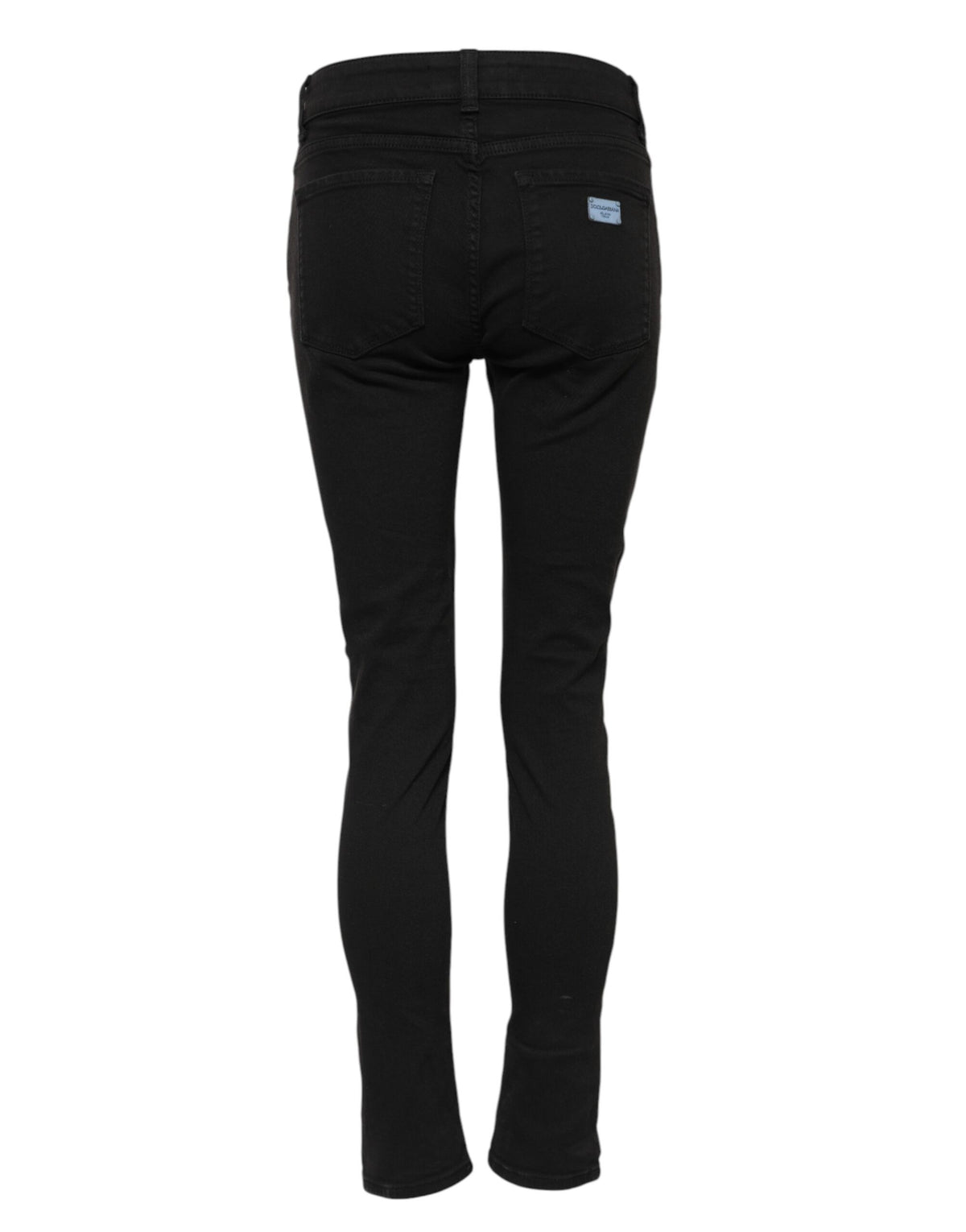 Indulge in the exquisite craftsmanship of Dolce & Gabbana's Black Cotton Logo Skinny Mid Waist Denim Jeans, where luxury meets timeless elegance for the discerning fashion lover.