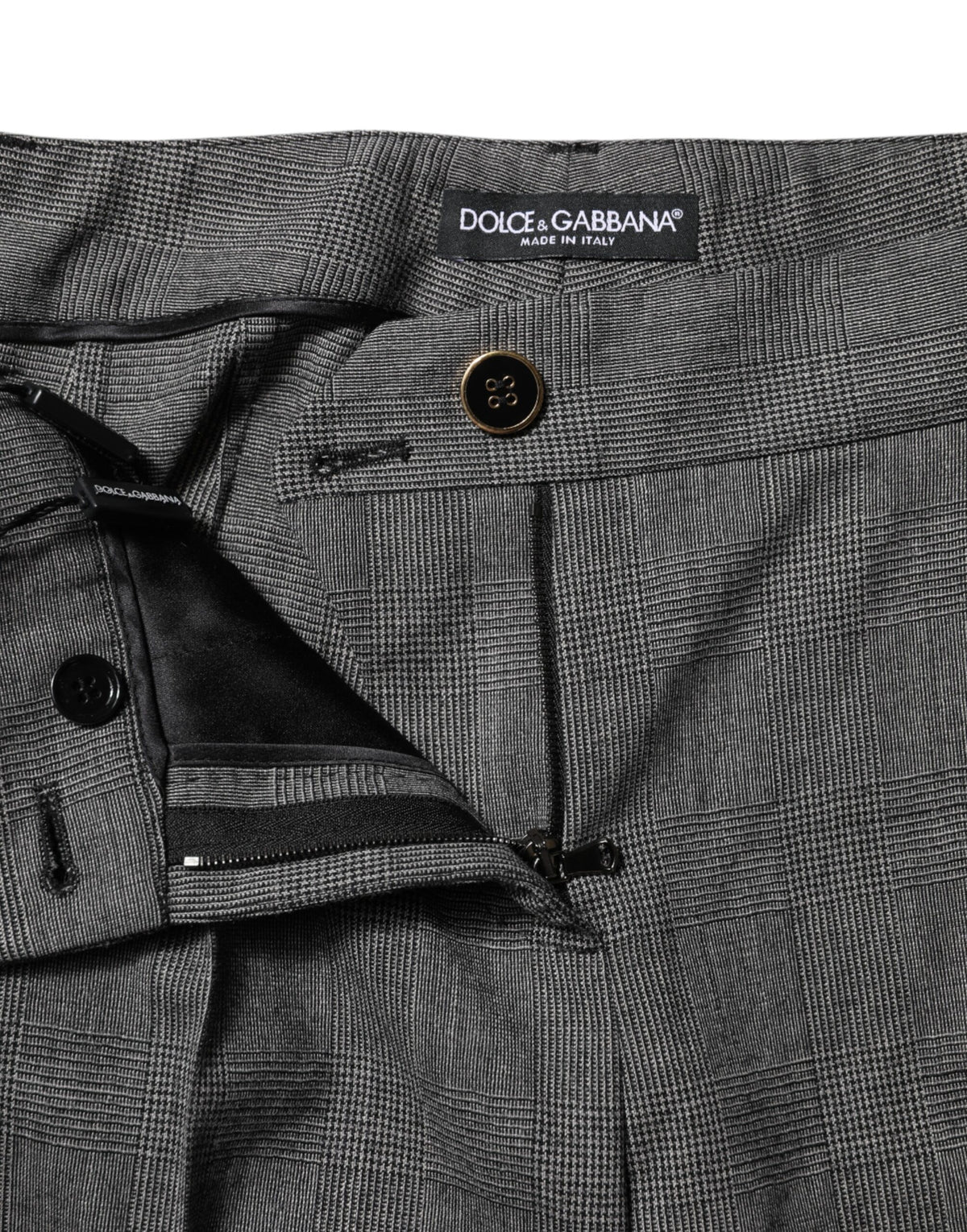 Indulge in the exquisite Dolce & Gabbana Gray Checkered High Waist Flared Pants, crafted from luxurious virgin wool for a silhouette that embodies elegance and sophistication.