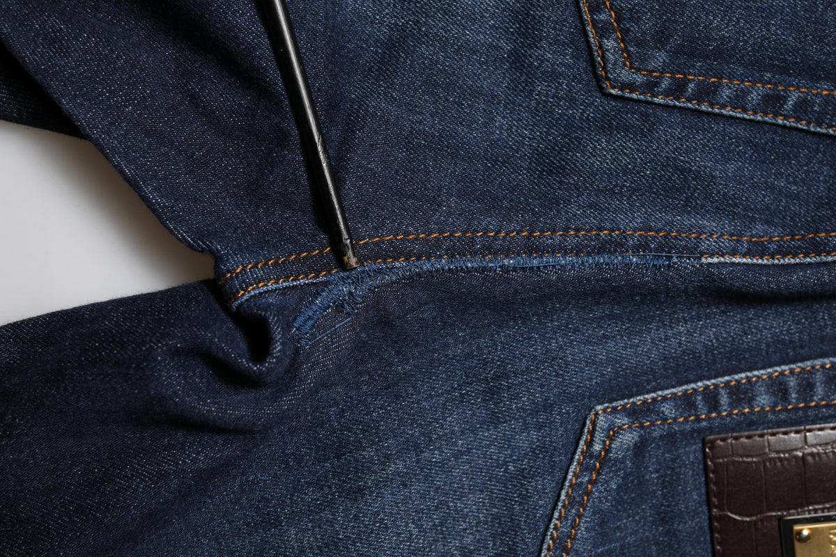 Elevate your wardrobe with Dolce & Gabbana Blue GRACE High Waist Skinny Denim Jeans, where exquisite Italian craftsmanship meets timeless luxury for the discerning individual.