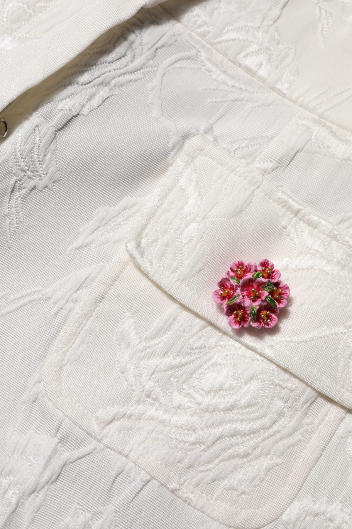 Elevate your wardrobe with Dolce & Gabbana's White Cotton Floral Jacquard Pants, a masterpiece of Italian craftsmanship that embodies timeless elegance and allure.