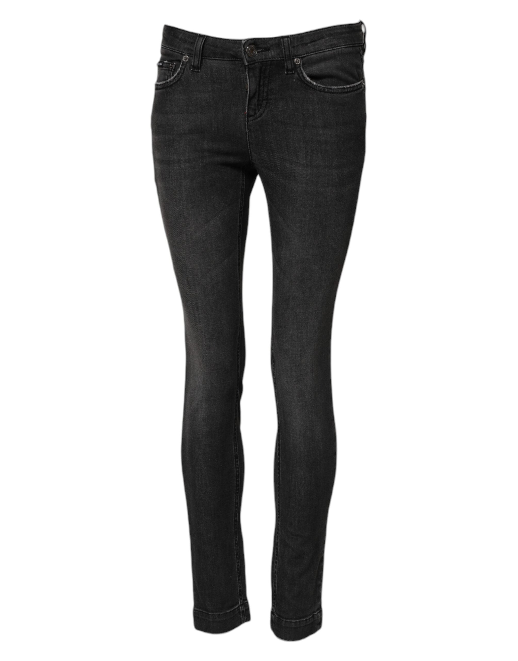 Indulge in the exquisite allure of Dolce & Gabbana's Black Cotton Low Waist Skinny Denim Jeans, where luxurious craftsmanship meets modern elegance for the discerning individual.