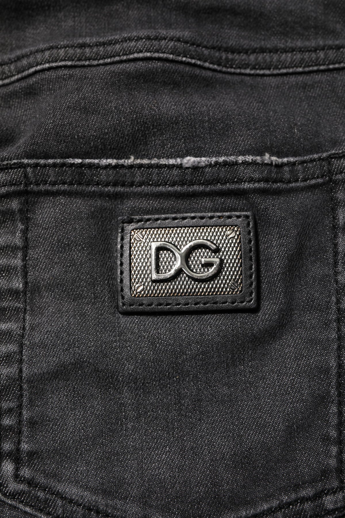 Indulge in the exquisite allure of Dolce & Gabbana's Black Cotton Low Waist Skinny Denim Jeans, where luxurious craftsmanship meets modern elegance for the discerning individual.