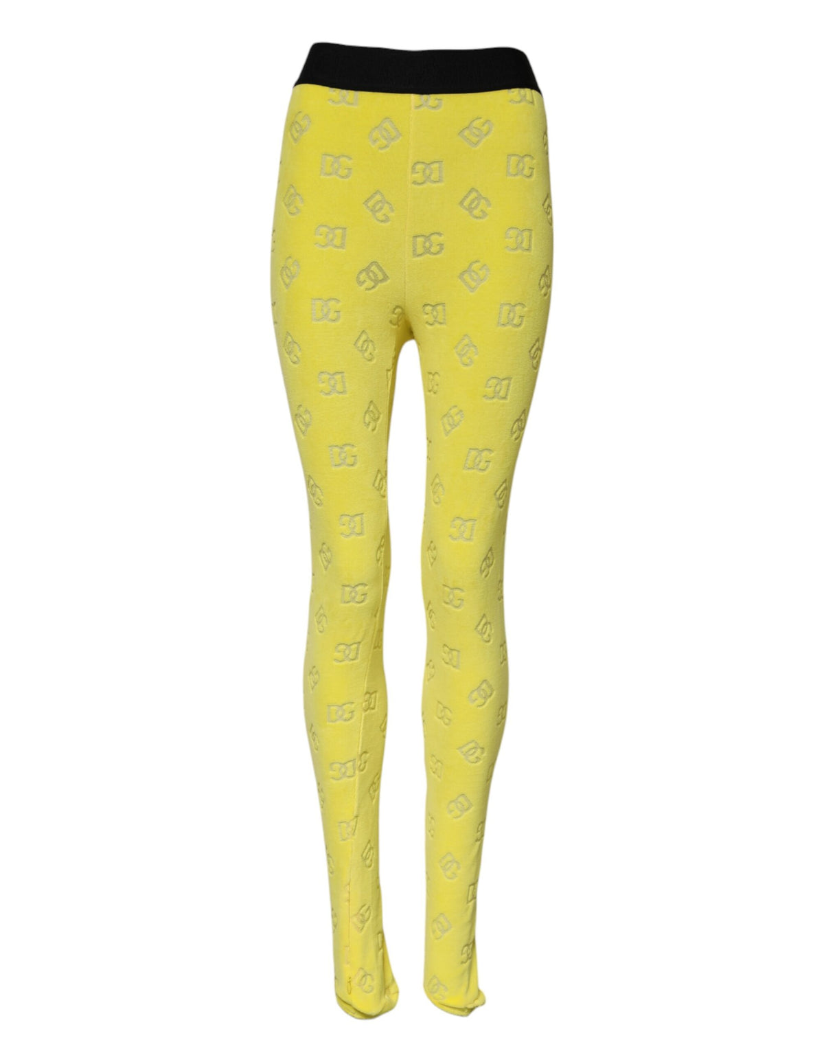 Experience the allure of Dolce & Gabbana's Yellow Logo Slim Fit Leggings Pants, crafted from 100% cotton, embodying exquisite Italian craftsmanship and timeless elegance.