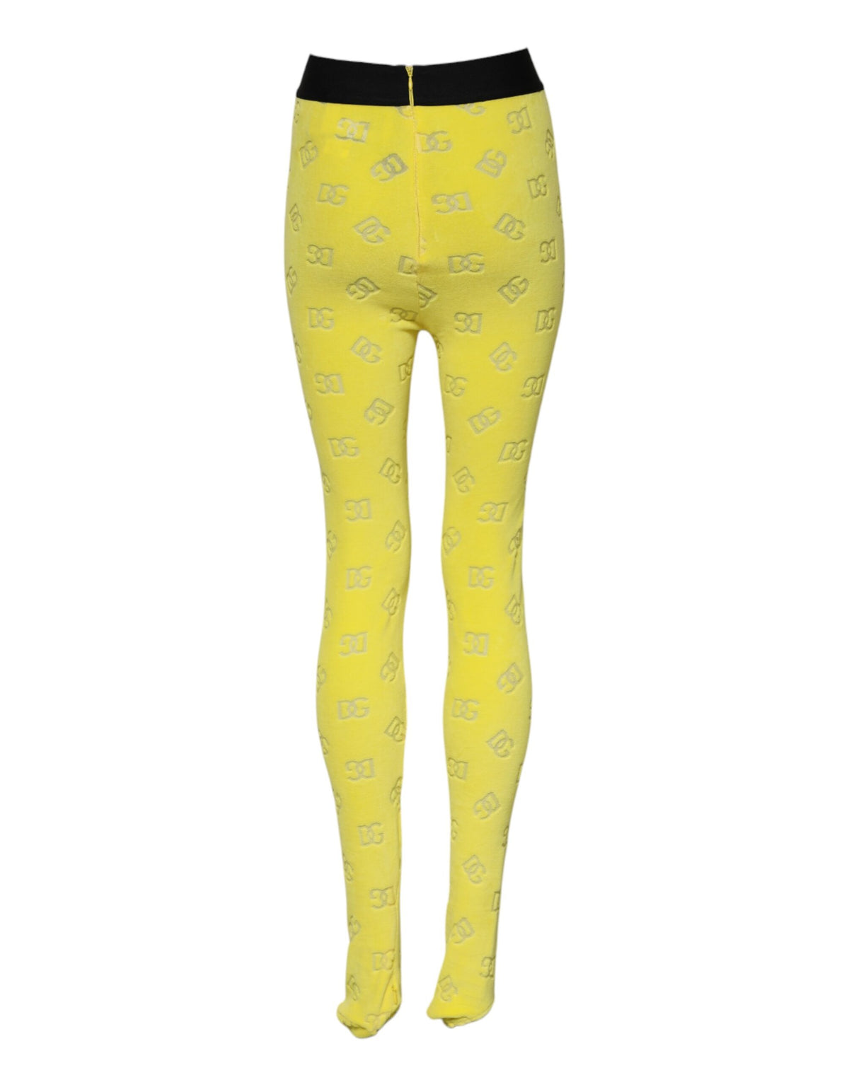 Indulge in the Dolce & Gabbana Yellow Logo Slim Fit Leggings Pants, crafted from 100% cotton, embodying exquisite Italian craftsmanship for effortless elegance and allure.