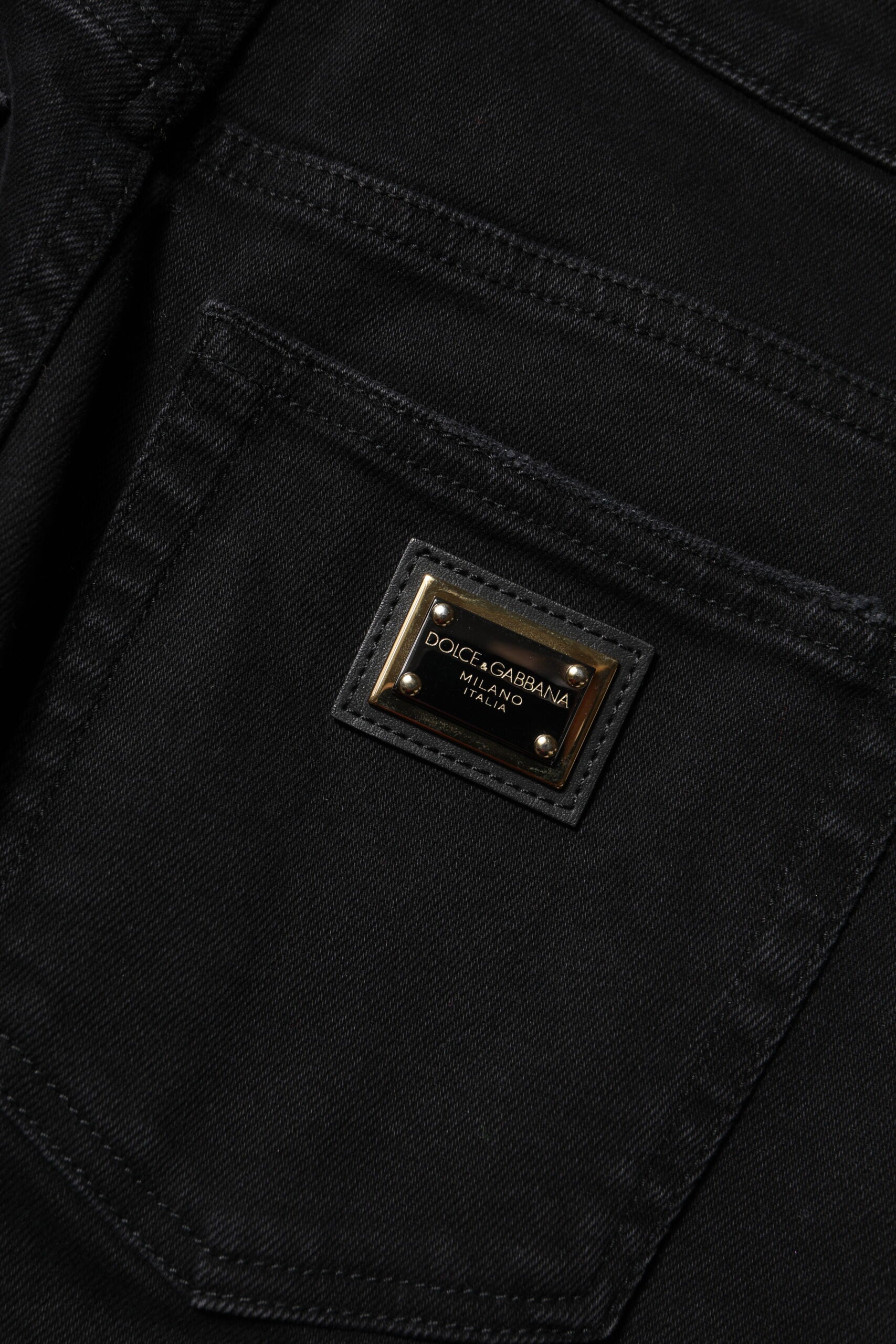 Elevate your wardrobe with Dolce & Gabbana's Black Boyfriend Cotton Flared Denim Jeans, where exquisite craftsmanship meets modern elegance for a timeless allure.