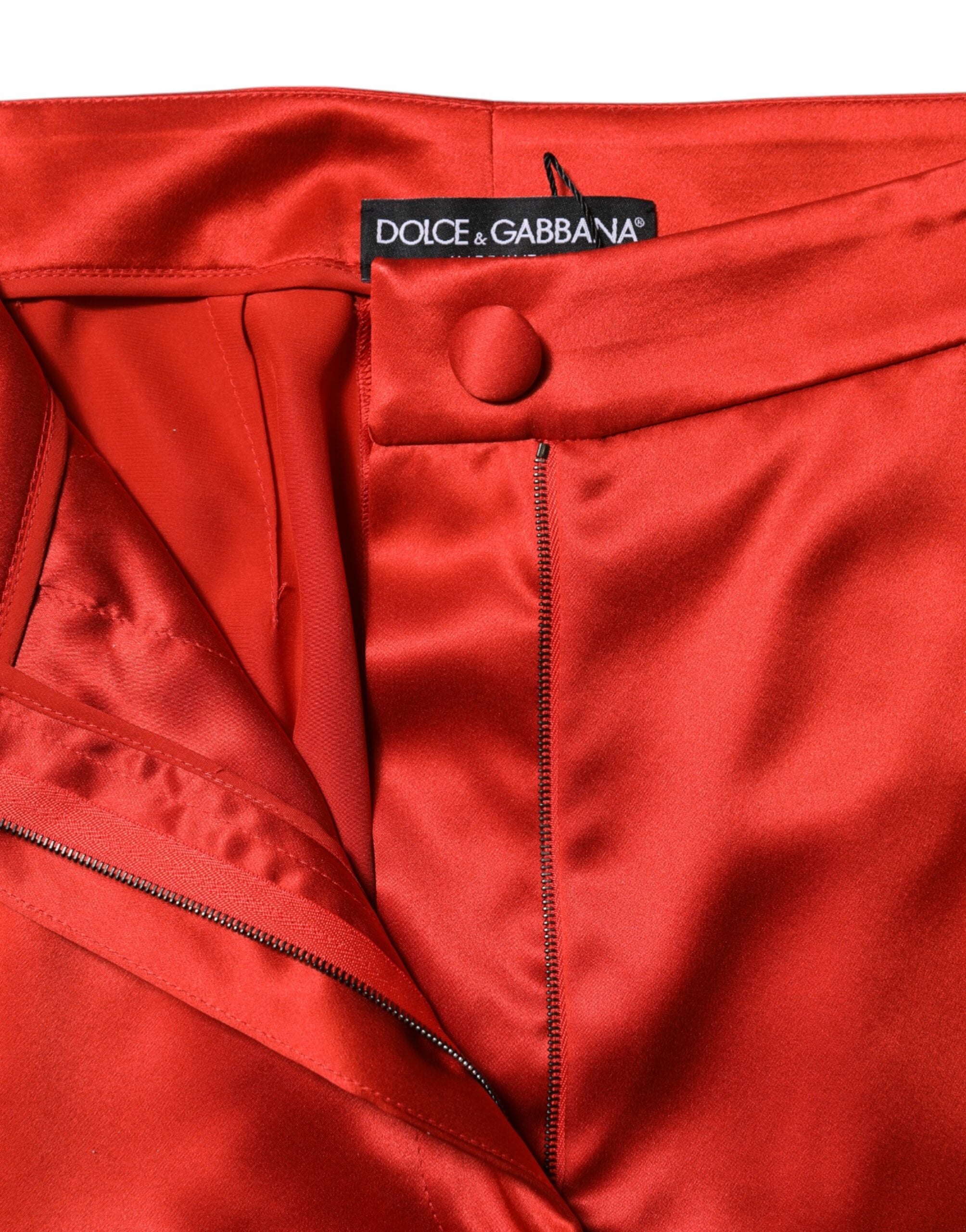 Experience the allure of Dolce & Gabbana's Red Satin High Waist Wide Leg Pants, a luxurious blend of 100% silk and exquisite craftsmanship, perfect for any sophisticated occasion.