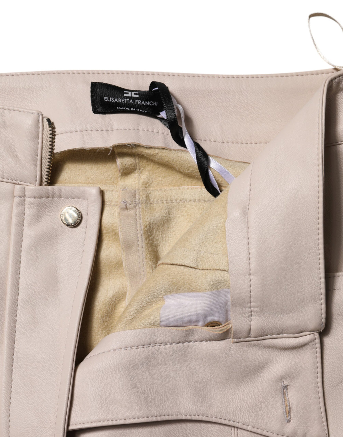 Discover the exquisite Elisabetta Franchi Beige High Waist Tapered Pants, a masterpiece of Italian craftsmanship that embodies timeless elegance and sophisticated allure.