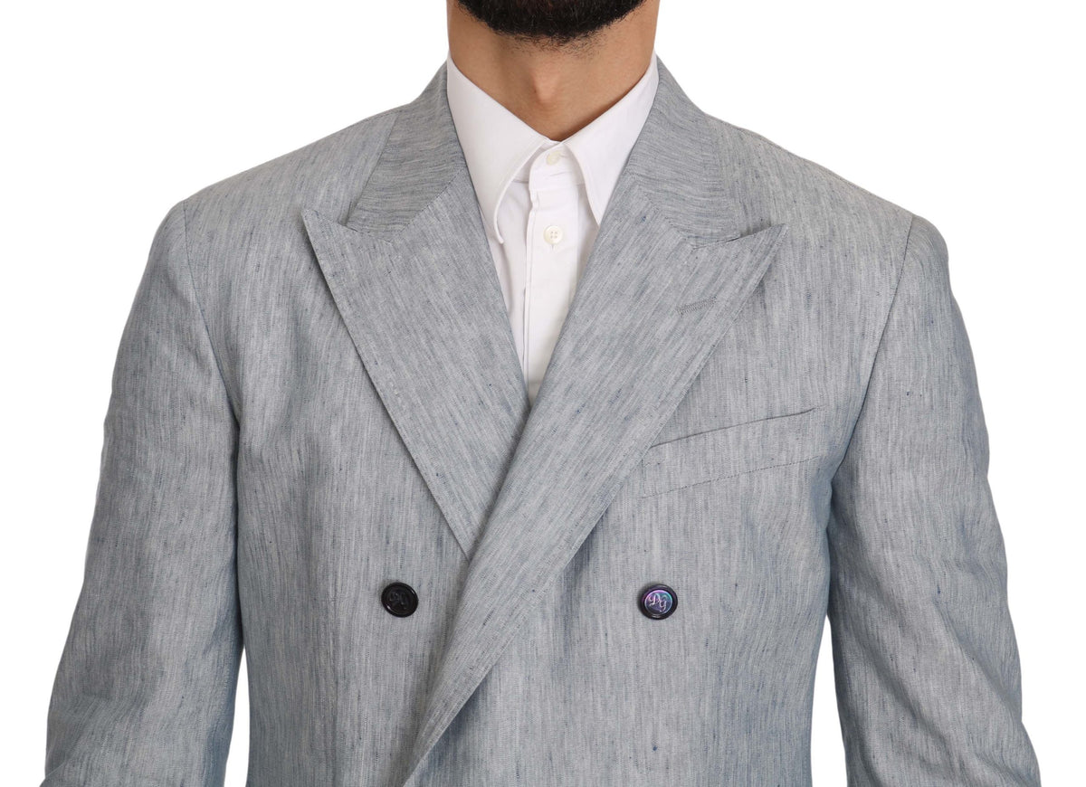 Elevate your wardrobe with the Dolce & Gabbana Blue Flax NAPOLI Jacket, a luxurious blend of flax and silk, showcasing exquisite Italian craftsmanship for the discerning individual.