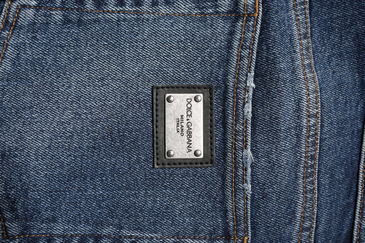 Elevate your style with Dolce & Gabbana Blue Cotton Mid Waisted Straight Denim Jeans, crafted in Italy from a luxurious cotton blend, embodying timeless elegance and sophistication.