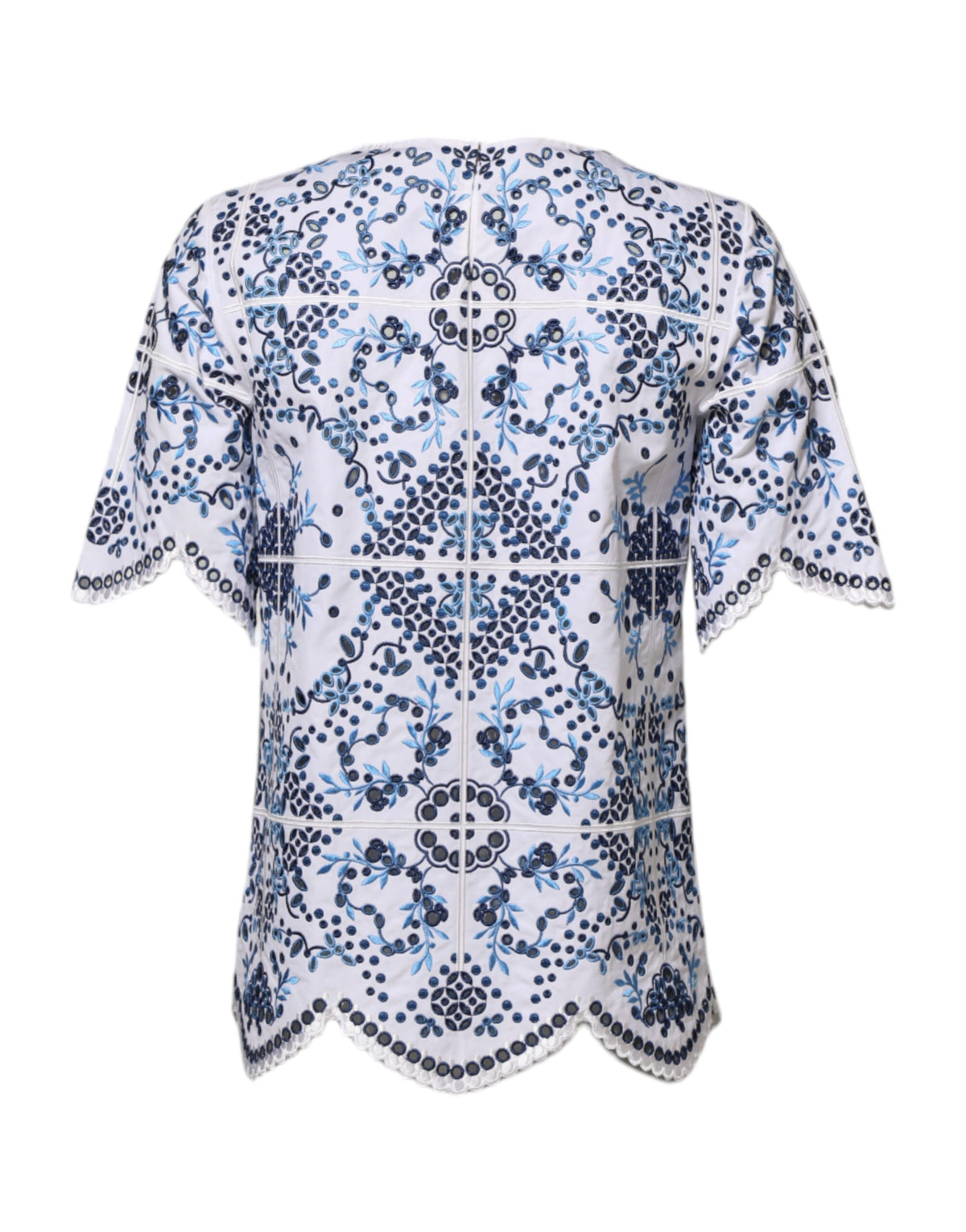 Experience the allure of Dolce & Gabbana's Blue Lace Eyelet Crew Neck Blouse, a testament to Italian craftsmanship, blending luxury and timeless elegance for the discerning individual.